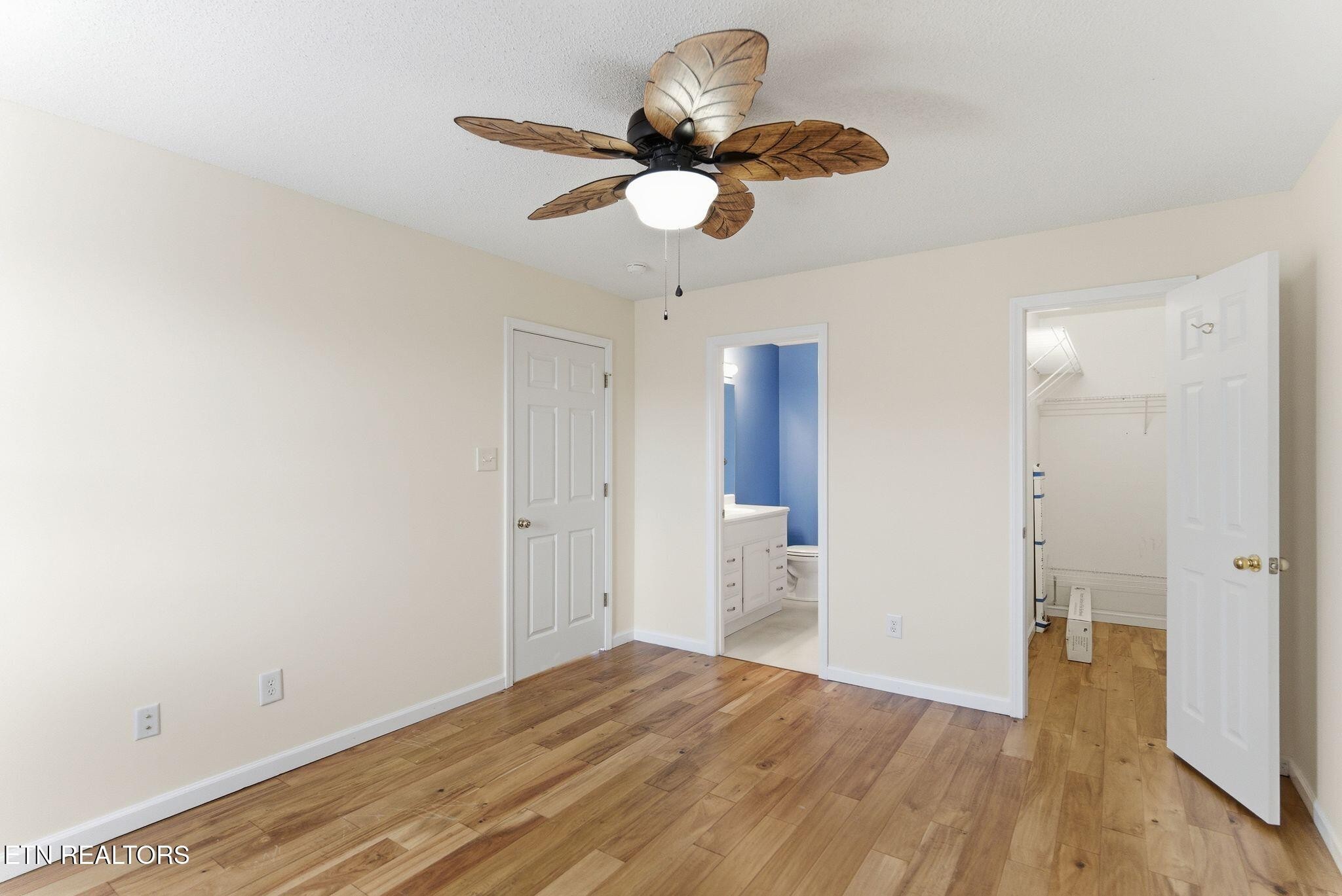 355 Hawthorne Oaks Way Powell, TN 37849 - Photo 17 of 31 a view of empty room with wooden floor