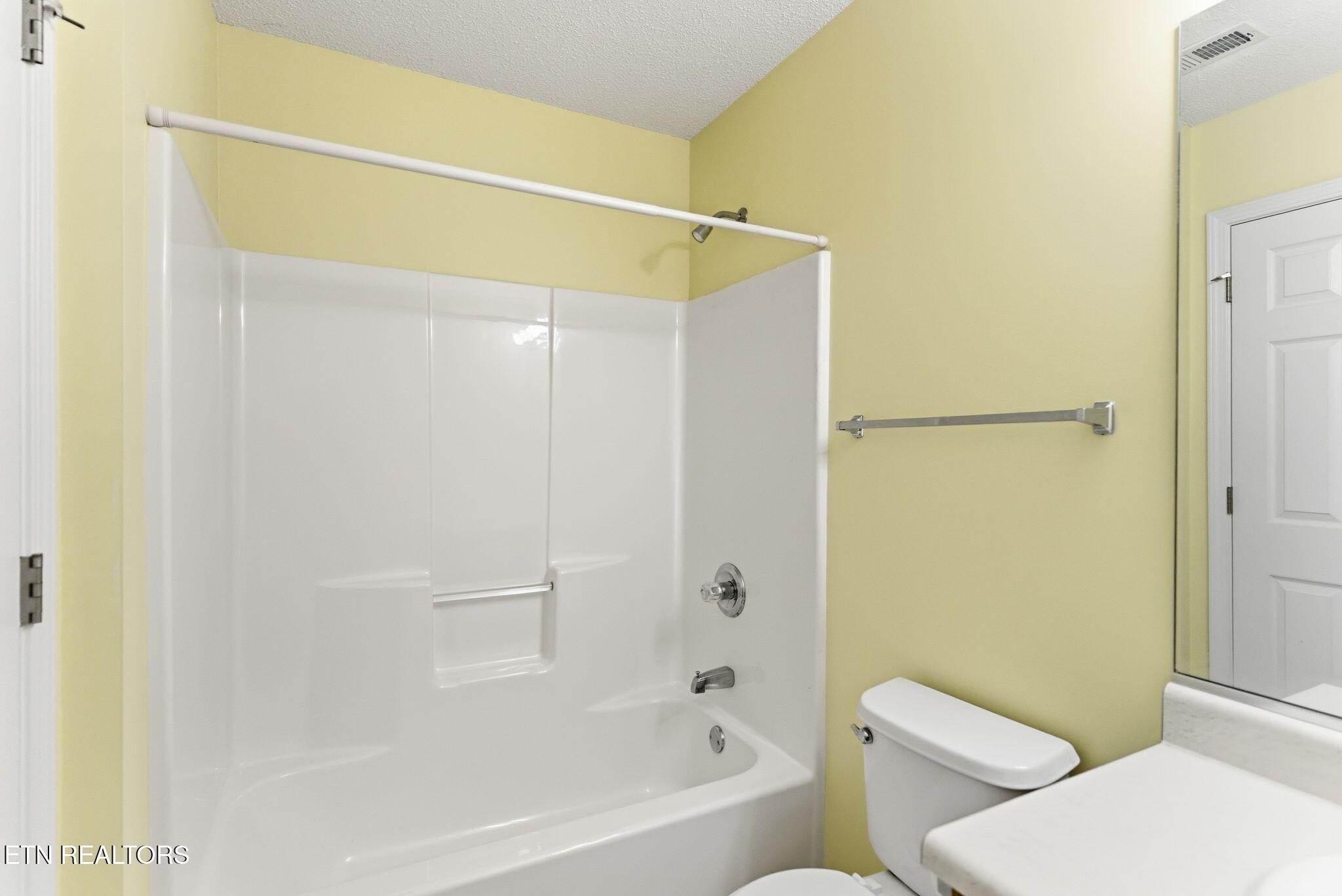 355 Hawthorne Oaks Way Powell, TN 37849 - Photo 24 of 31 a bathroom with a shower and a toilet