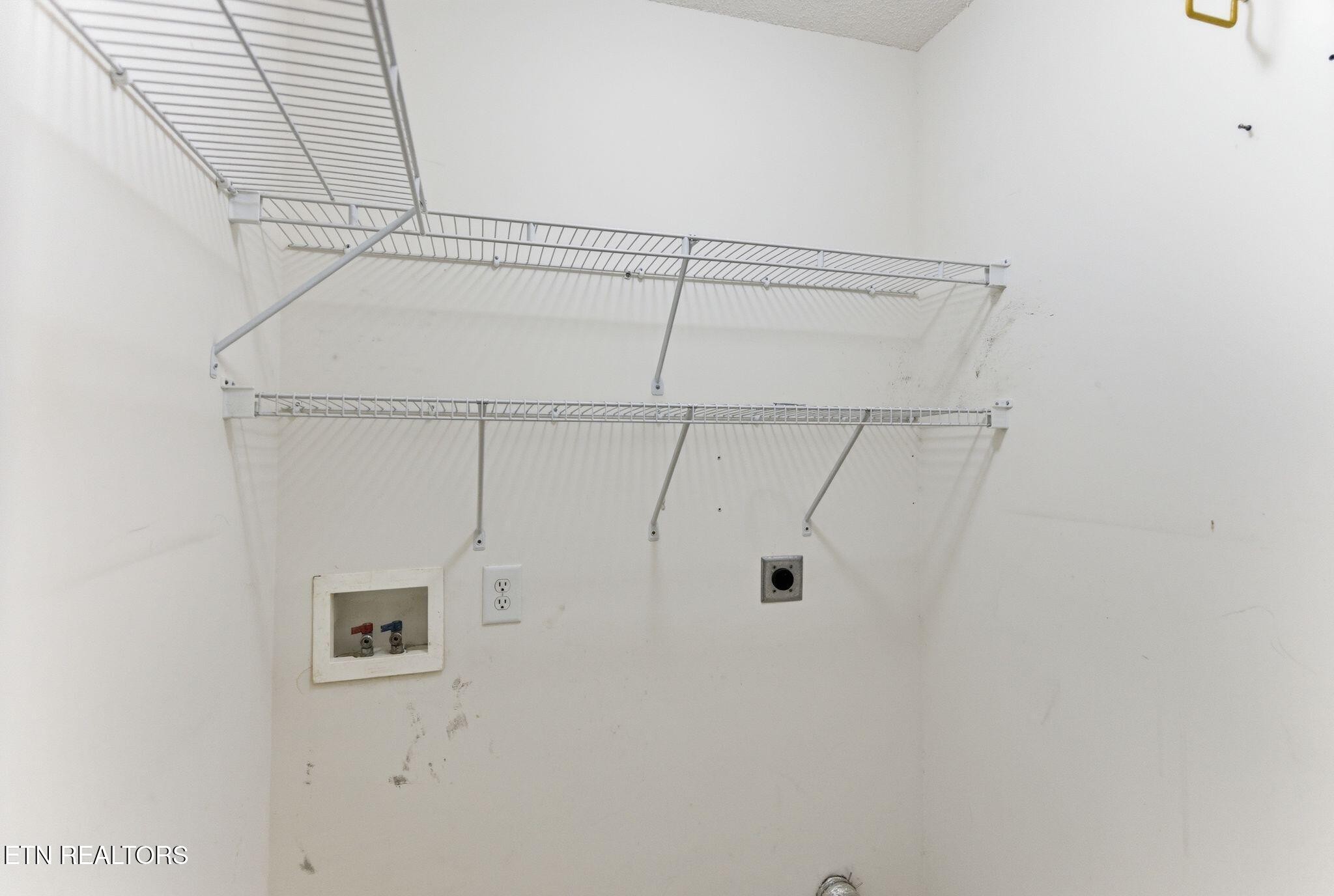 355 Hawthorne Oaks Way Powell, TN 37849 - Photo 25 of 31 a view of a room with racks on the wall