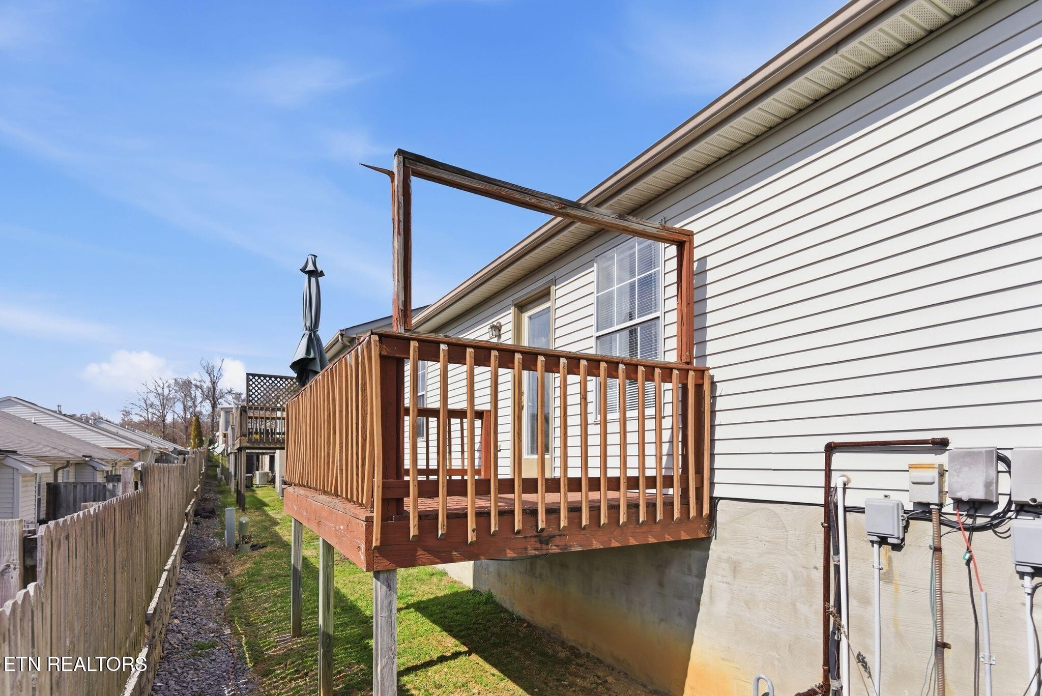 355 Hawthorne Oaks Way Powell, TN 37849 - Photo 29 of 31 a view of balcony with wooden stairs