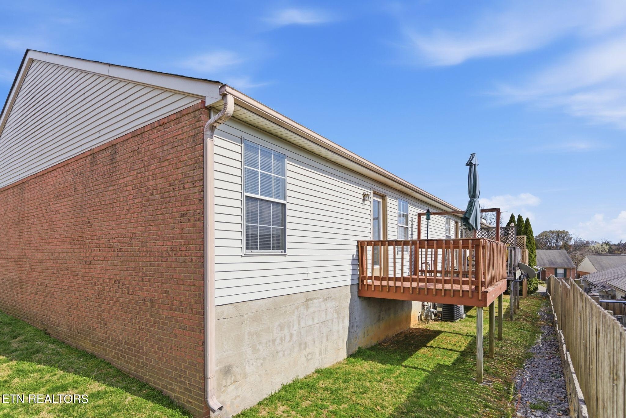 355 Hawthorne Oaks Way Powell, TN 37849 - Photo 30 of 31 a view of a house with a yard