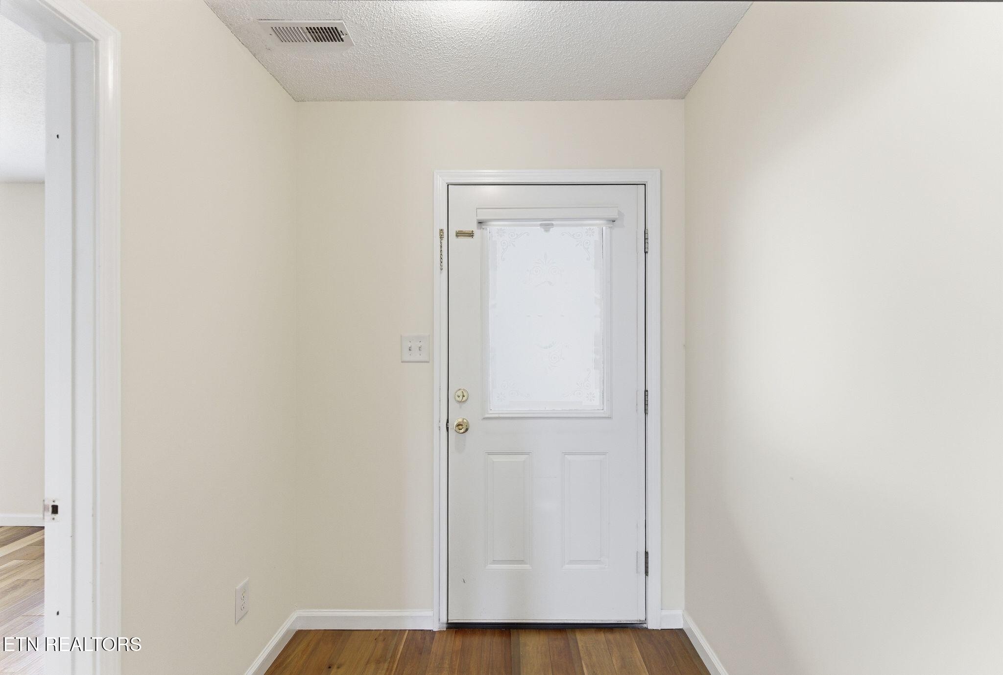 355 Hawthorne Oaks Way Powell, TN 37849 - Photo 6 of 31 a view of front door with wooden floor