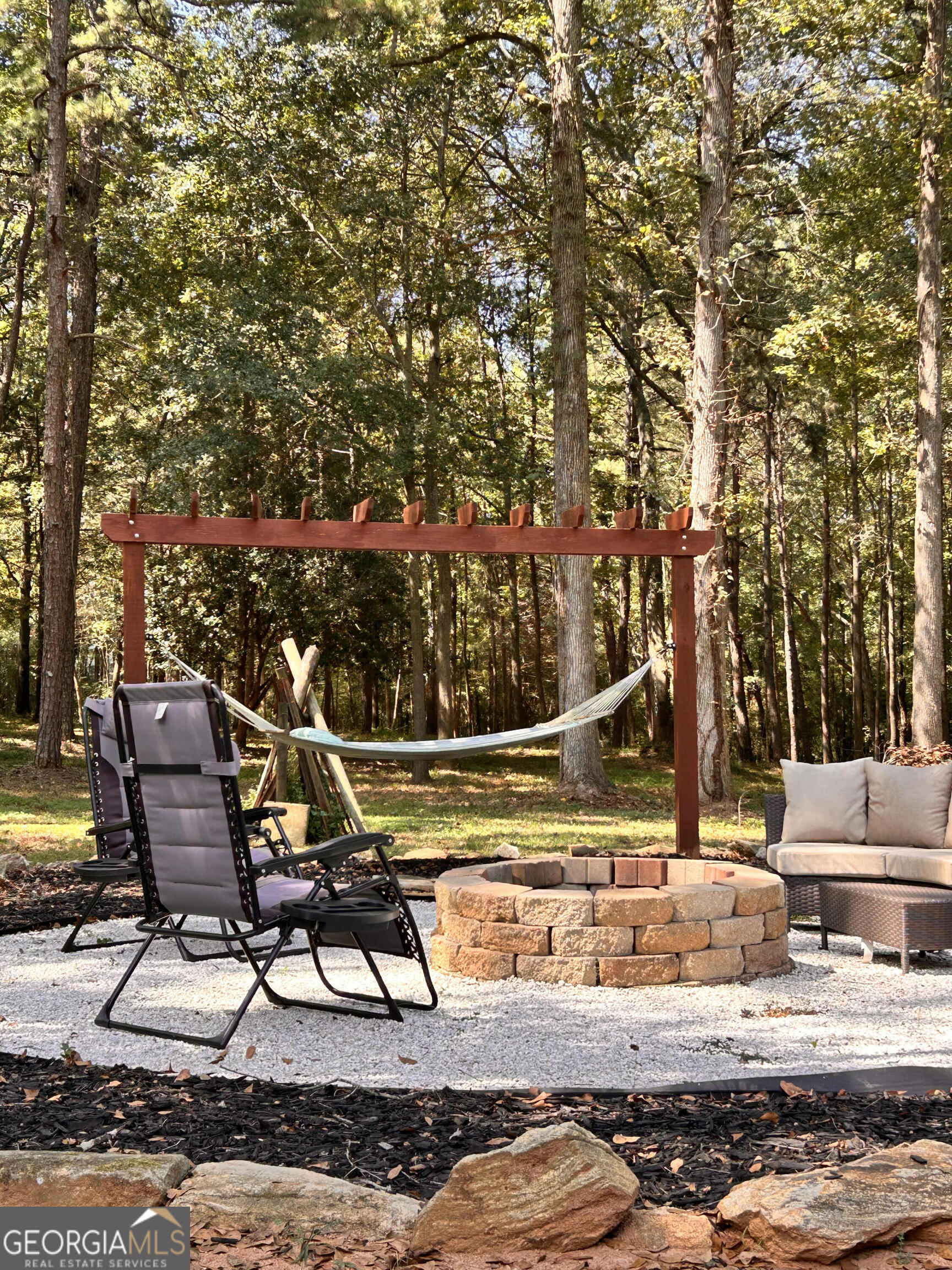 711 West Ridgeway Road Maysville, GA 30558 - Photo 27 of 38 a view of a yard with wooden deck