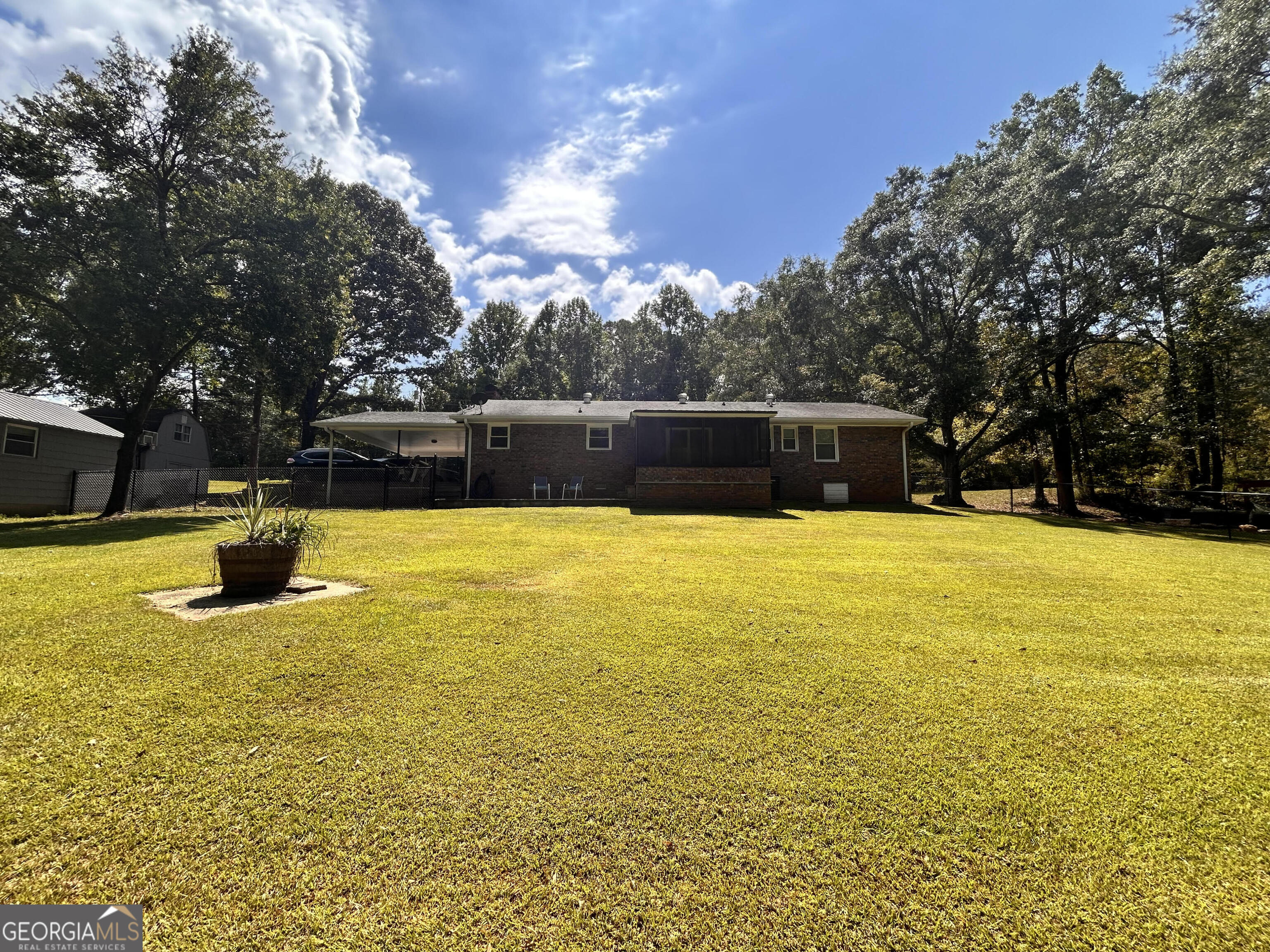 711 West Ridgeway Road Maysville, GA 30558 - Photo 31 of 38 a view of an outdoor space and swimming pool