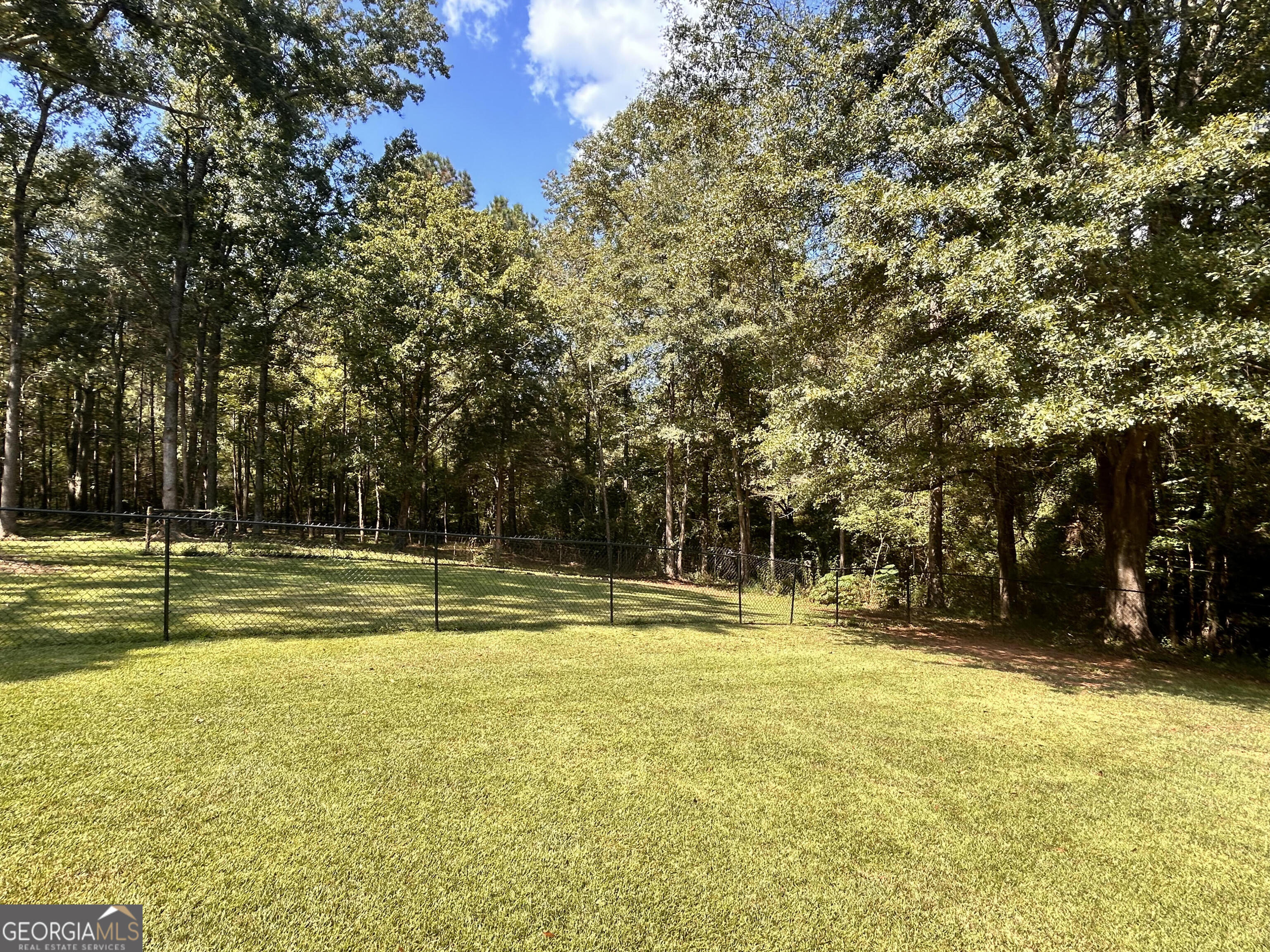 711 West Ridgeway Road Maysville, GA 30558 - Photo 32 of 38 a view of a swimming pool with an outdoor space