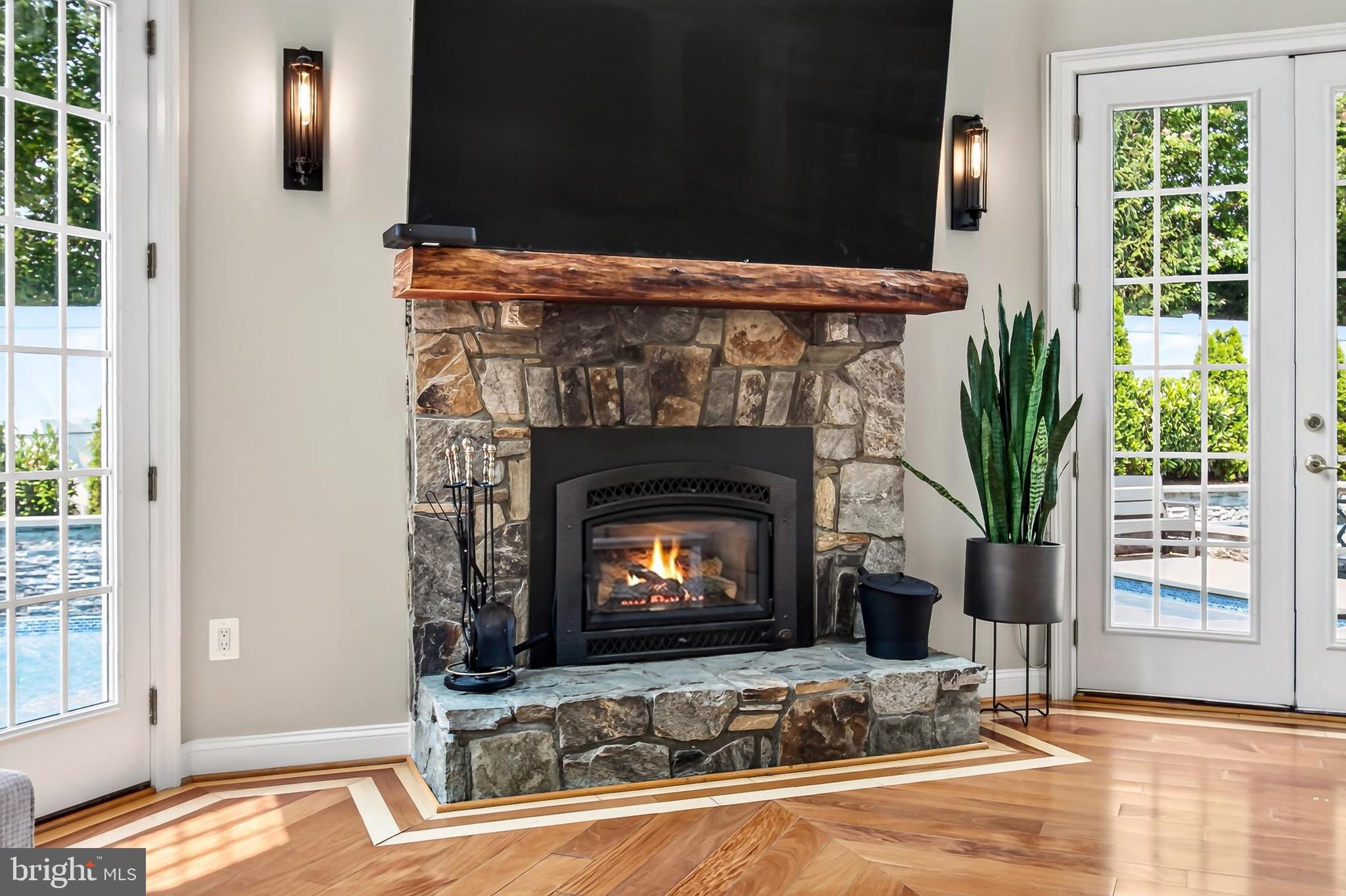8836 Rommel Drive Lorton, VA 22079 - Photo 24 of 133 Stone accent wall -wood burning fireplace