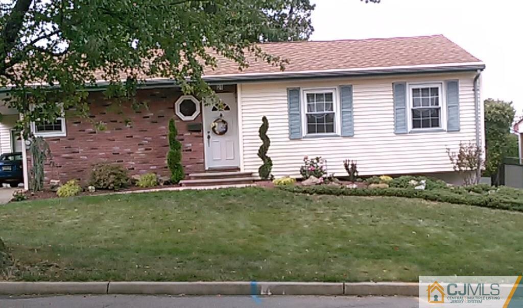21 Georgetown Road Old Bridge, NJ 08859 - Photo 3 of 17 a front view of a house with garden