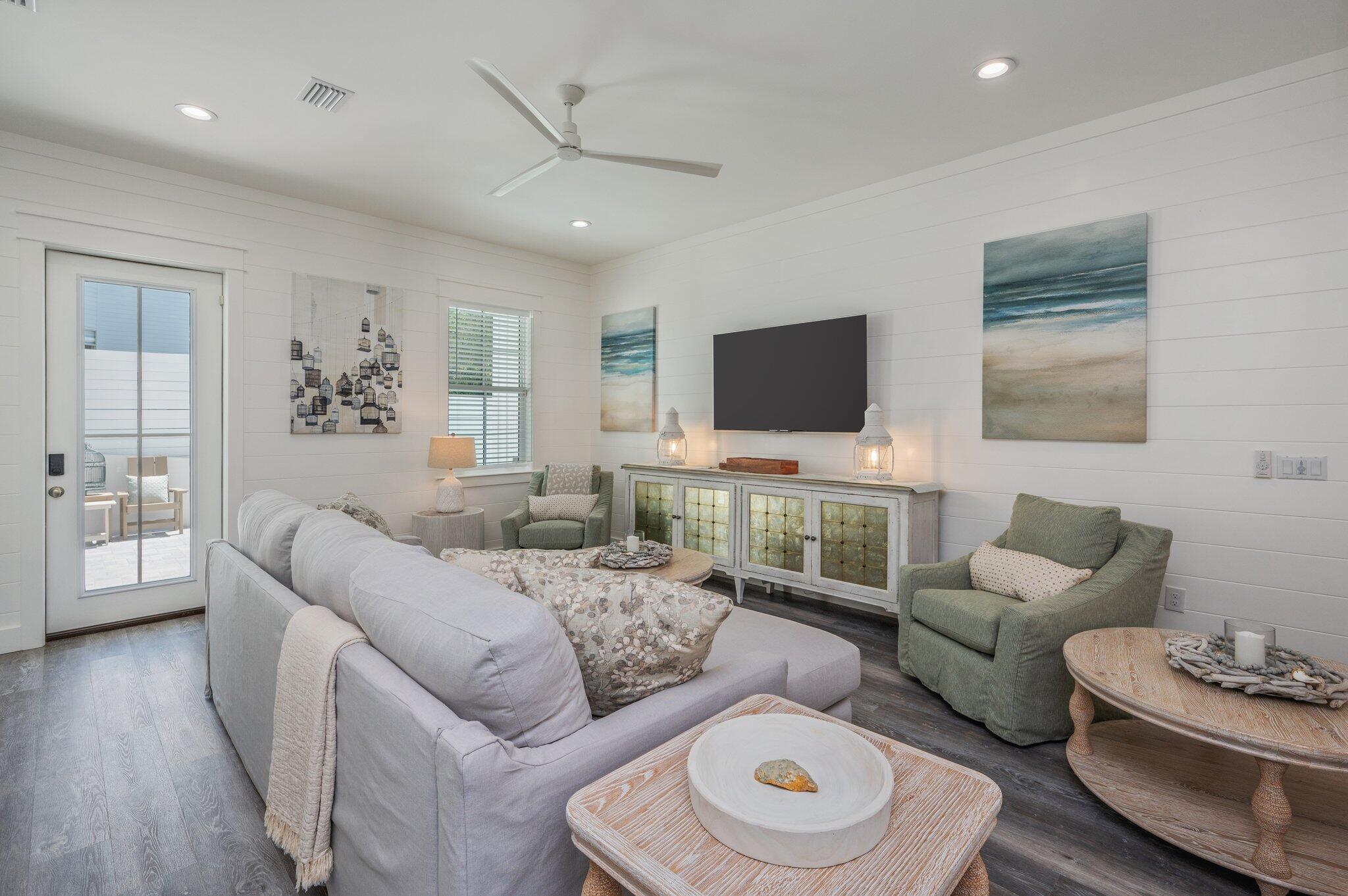 59 Marthas Lane Santa Rosa Beach, FL 32459 - Photo 13 of 85 a living room with furniture and a flat screen tv