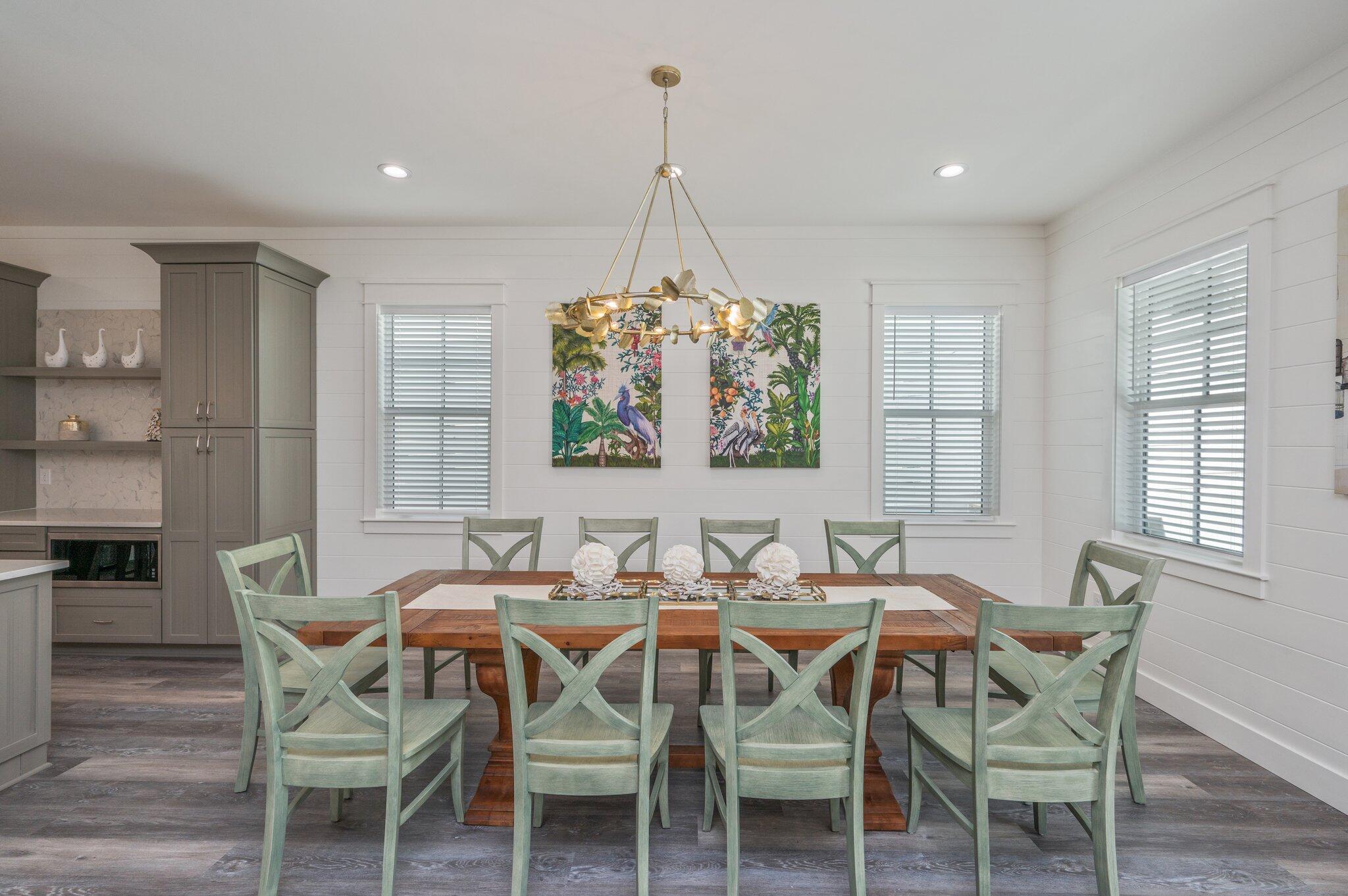 59 Marthas Lane Santa Rosa Beach, FL 32459 - Photo 20 of 85 a dining room with furniture a chandelier and wooden floor