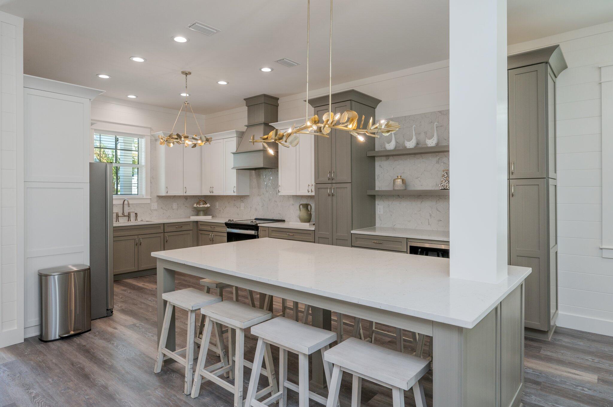 59 Marthas Lane Santa Rosa Beach, FL 32459 - Photo 24 of 85 a kitchen with a table and chairs in it