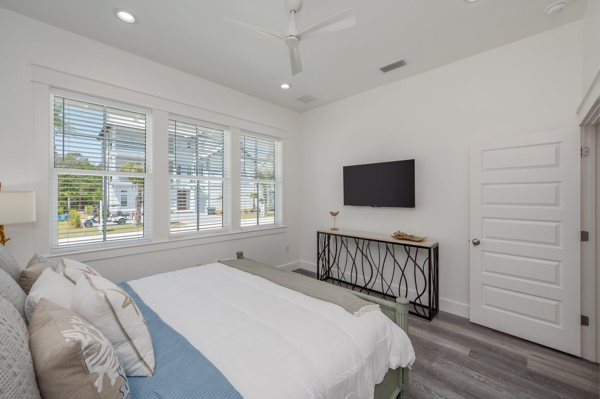 59 Marthas Lane Santa Rosa Beach, FL 32459 - Photo 32 of 85 a bedroom with a bed and flat screen tv