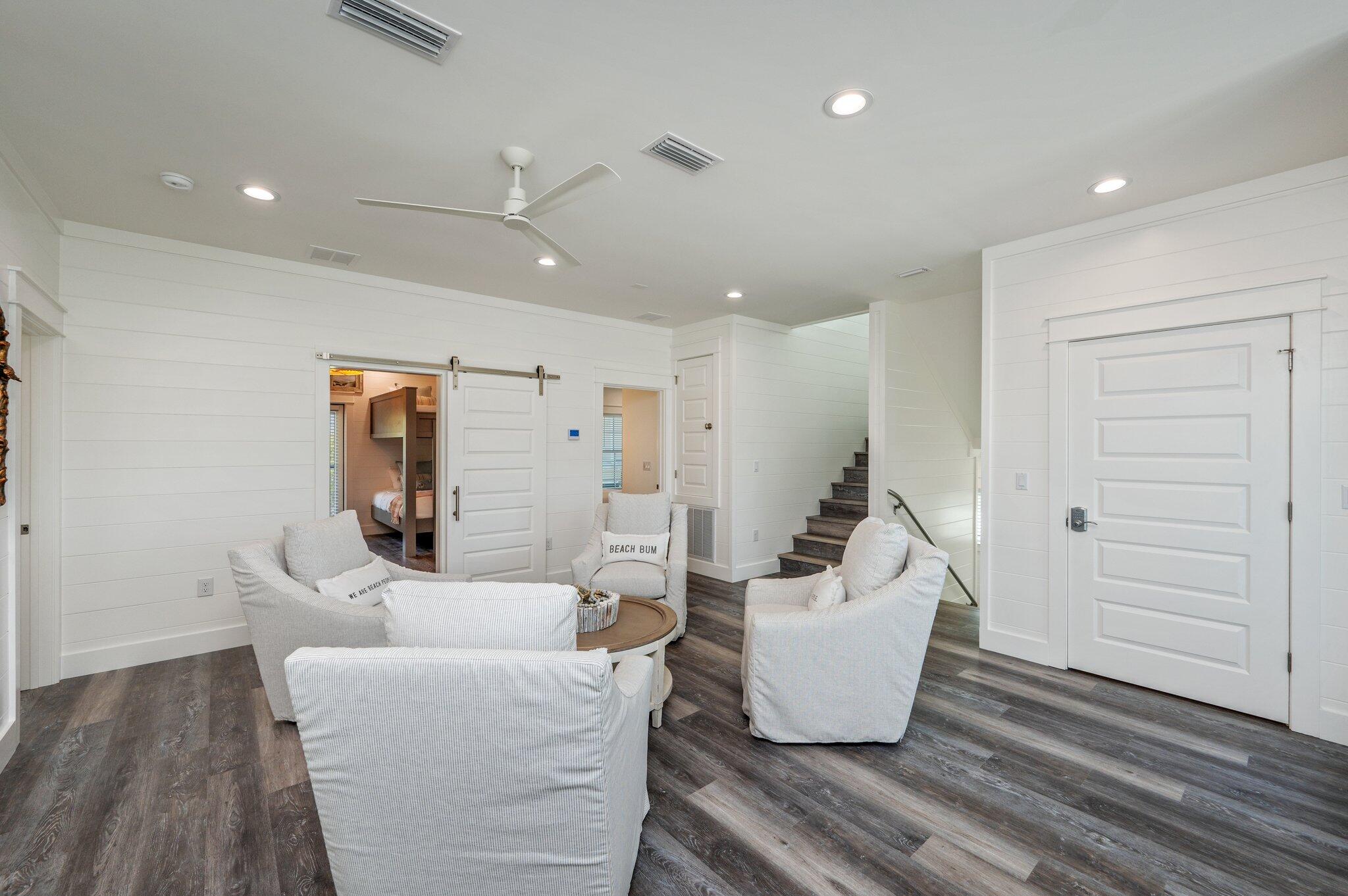 59 Marthas Lane Santa Rosa Beach, FL 32459 - Photo 39 of 85 a living room with furniture and a wooden floor