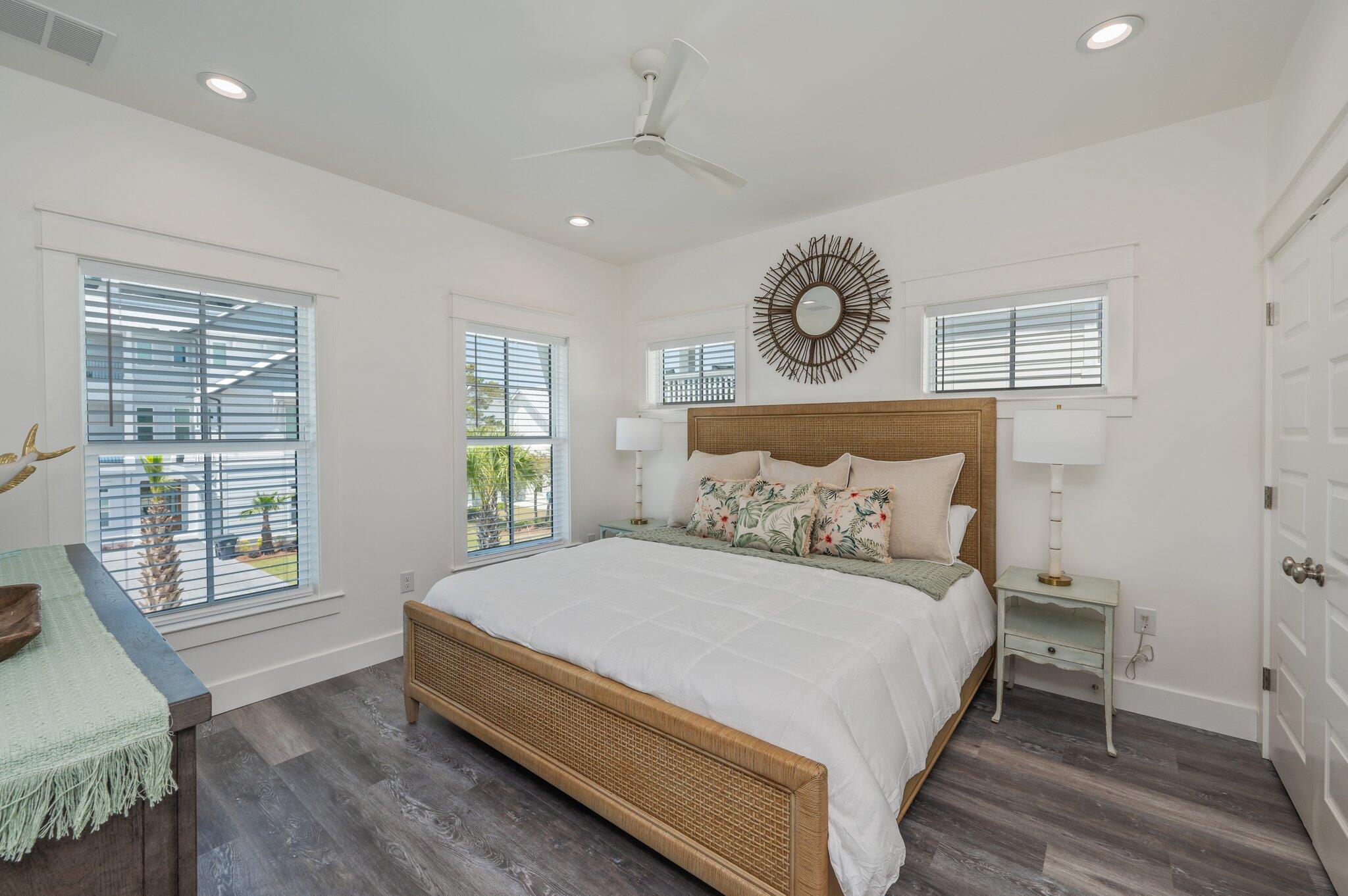 59 Marthas Lane Santa Rosa Beach, FL 32459 - Photo 40 of 85 a large bed sitting in a bedroom next to a window