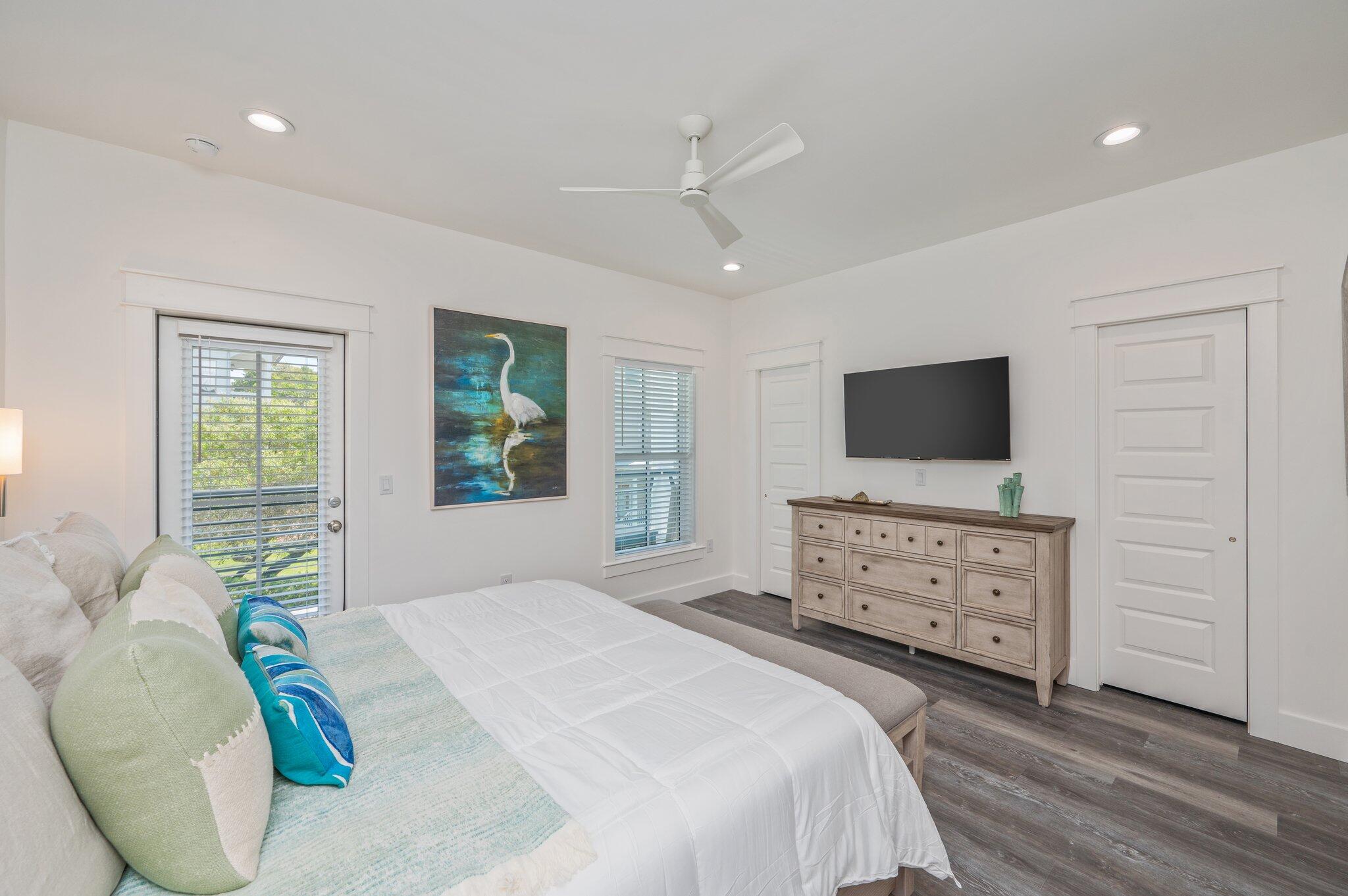 59 Marthas Lane Santa Rosa Beach, FL 32459 - Photo 54 of 85 a bedroom with a bed and flat screen tv