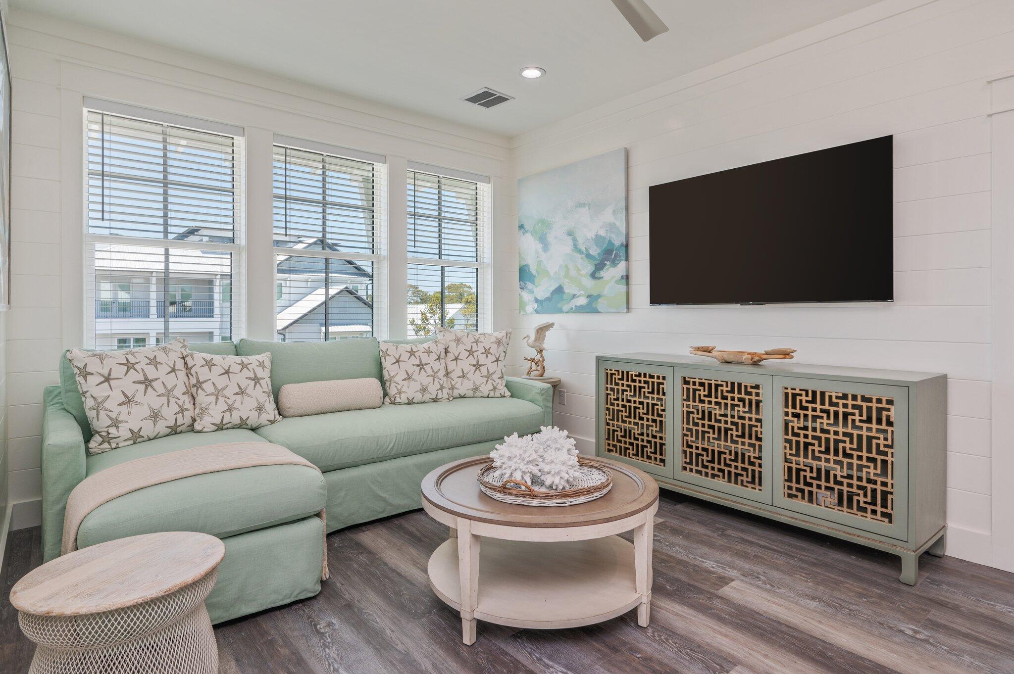 59 Marthas Lane Santa Rosa Beach, FL 32459 - Photo 60 of 85 a living room with furniture and a flat screen tv