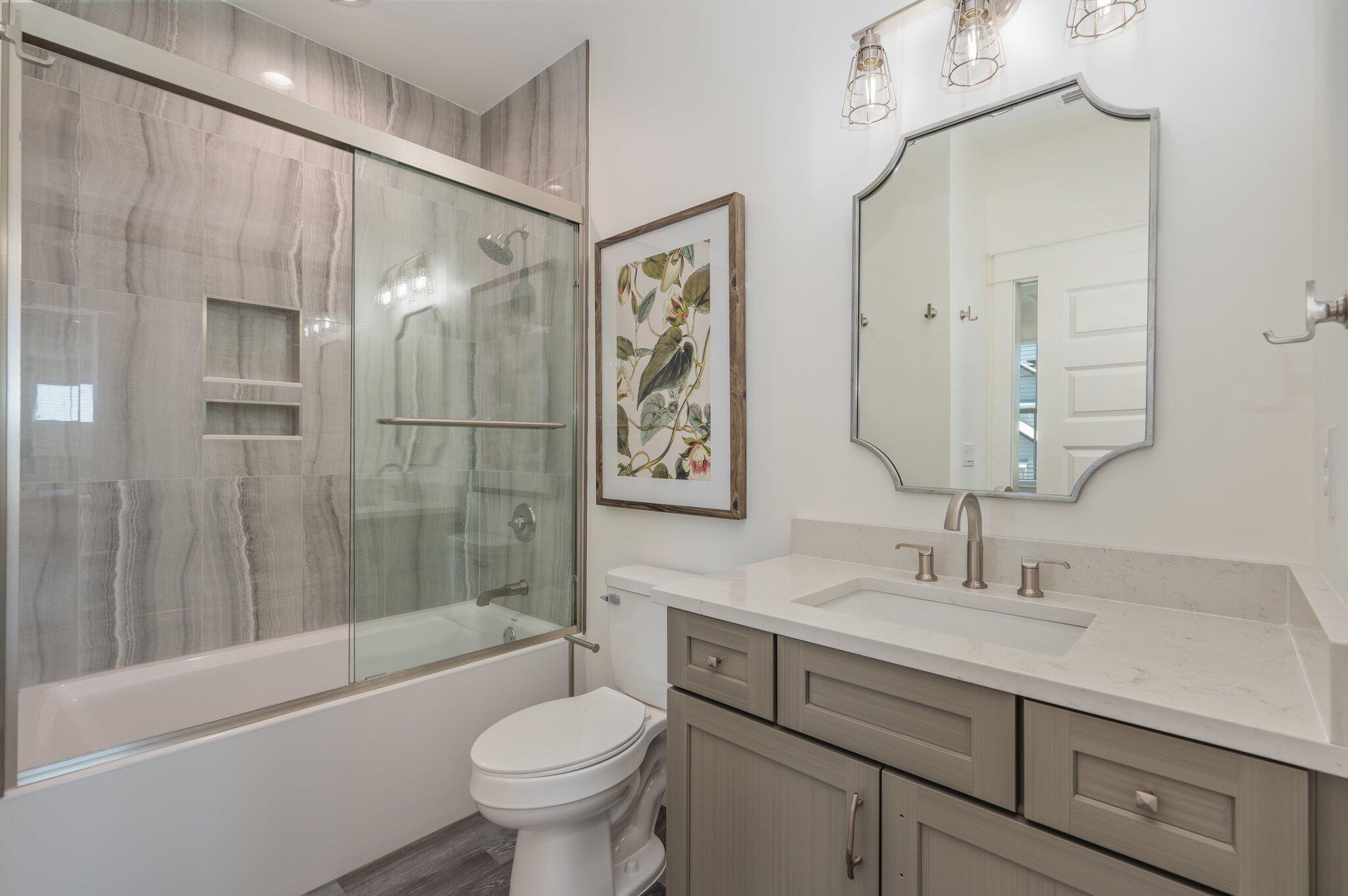 59 Marthas Lane Santa Rosa Beach, FL 32459 - Photo 65 of 85 a bathroom with a sink a toilet and shower