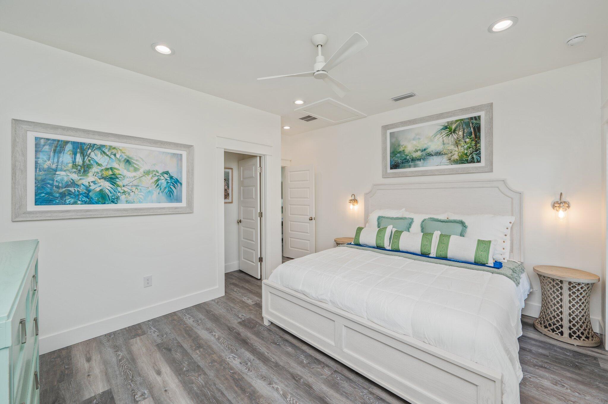 59 Marthas Lane Santa Rosa Beach, FL 32459 - Photo 71 of 85 a bedroom with a large bed and a painting on the wall