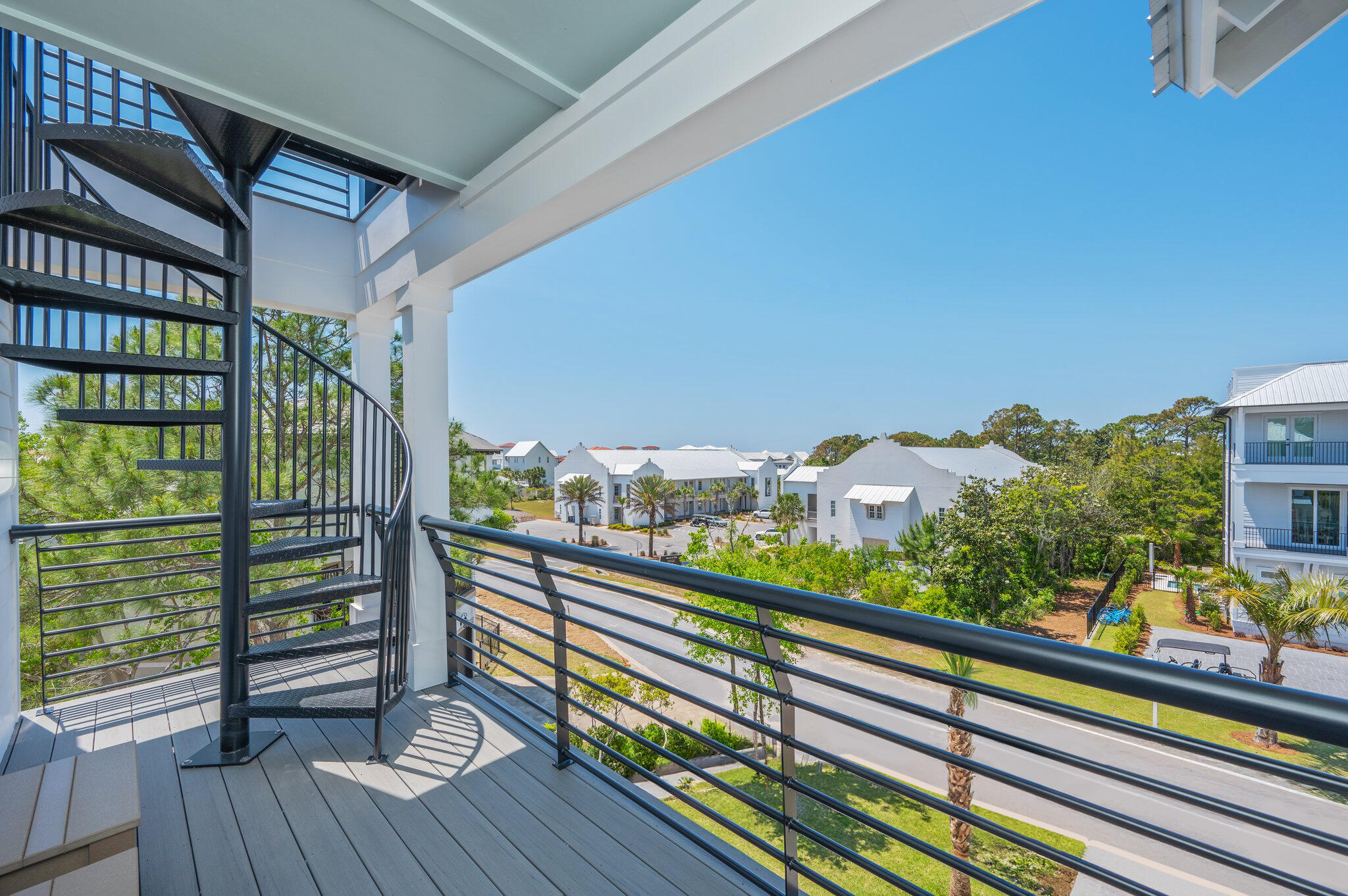 59 Marthas Lane Santa Rosa Beach, FL 32459 - Photo 79 of 85 a view of a balcony with wooden floor and outdoor space