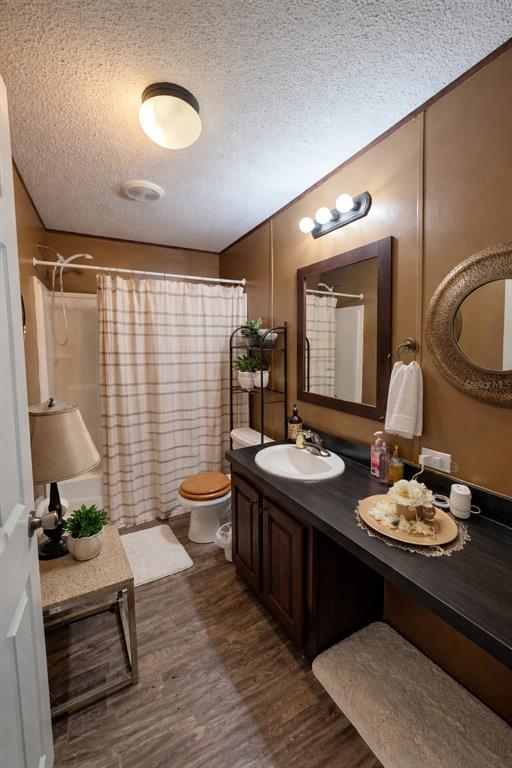 10630 Northeast 80th Street Bronson, FL 32621 - Photo 11 of 19 a living room with furniture and a table