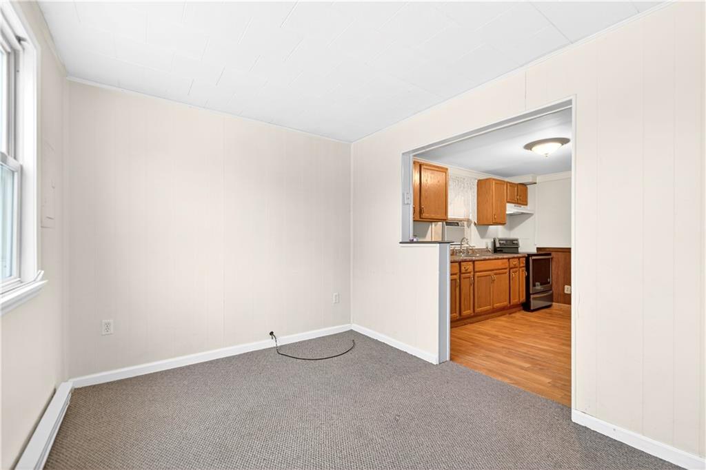 203 Navy Street Perryopolis, PA 15473 - Photo 7 of 24 LIVING ROOM SPACE OFF OF KITCHEN~