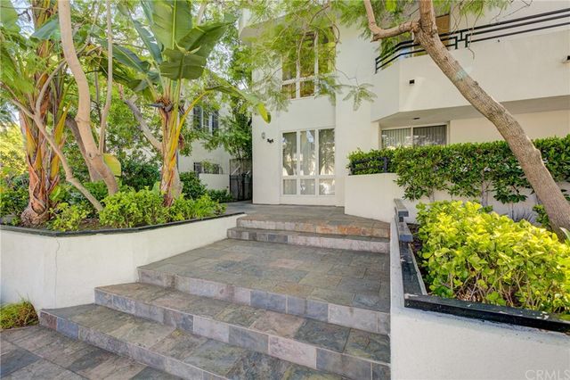 a view of a garden with pathway