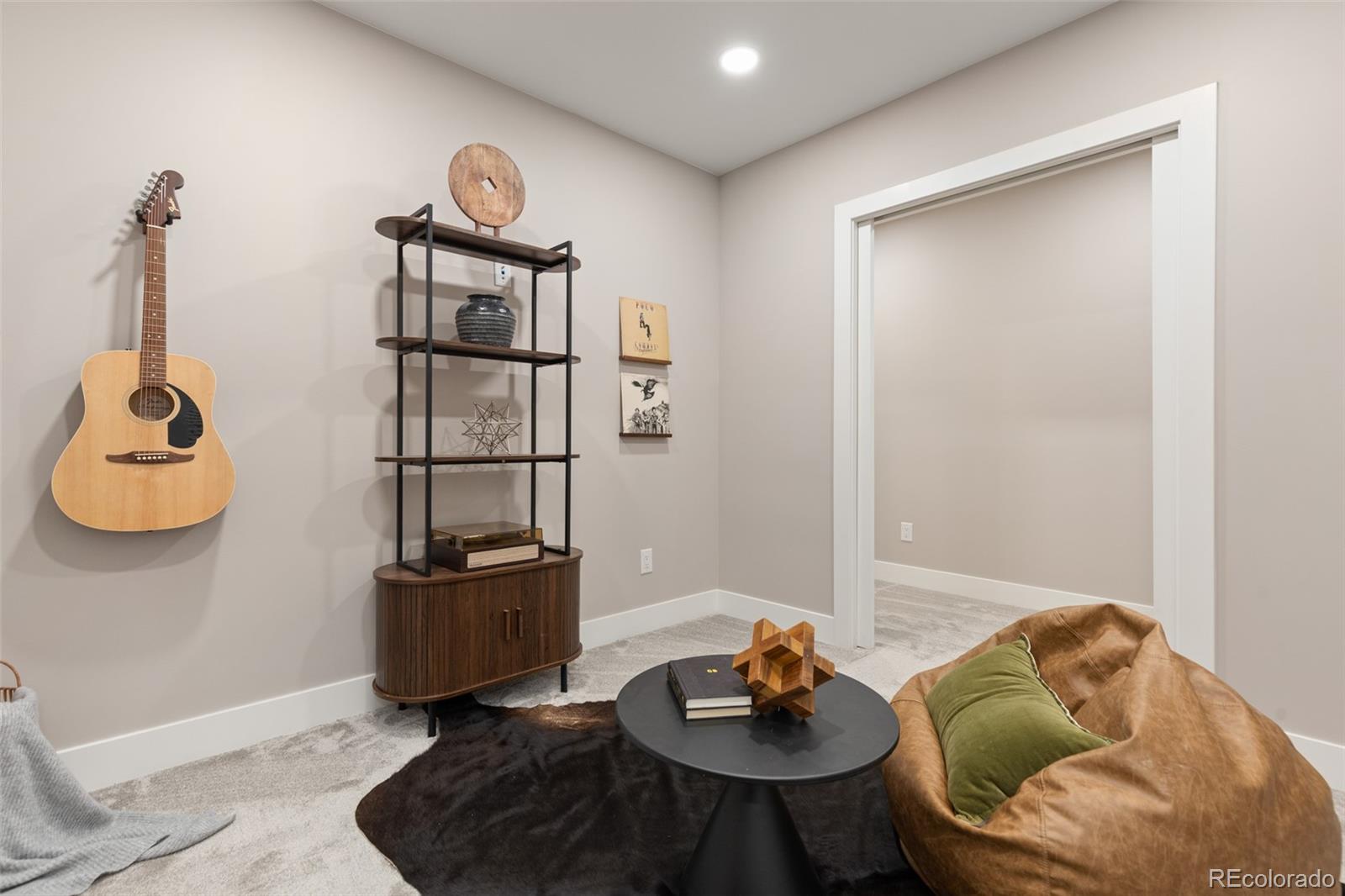 11895 West 35th Avenue Wheat Ridge, CO 80033 - Photo 37 of 50 a living room with furniture and a mirror