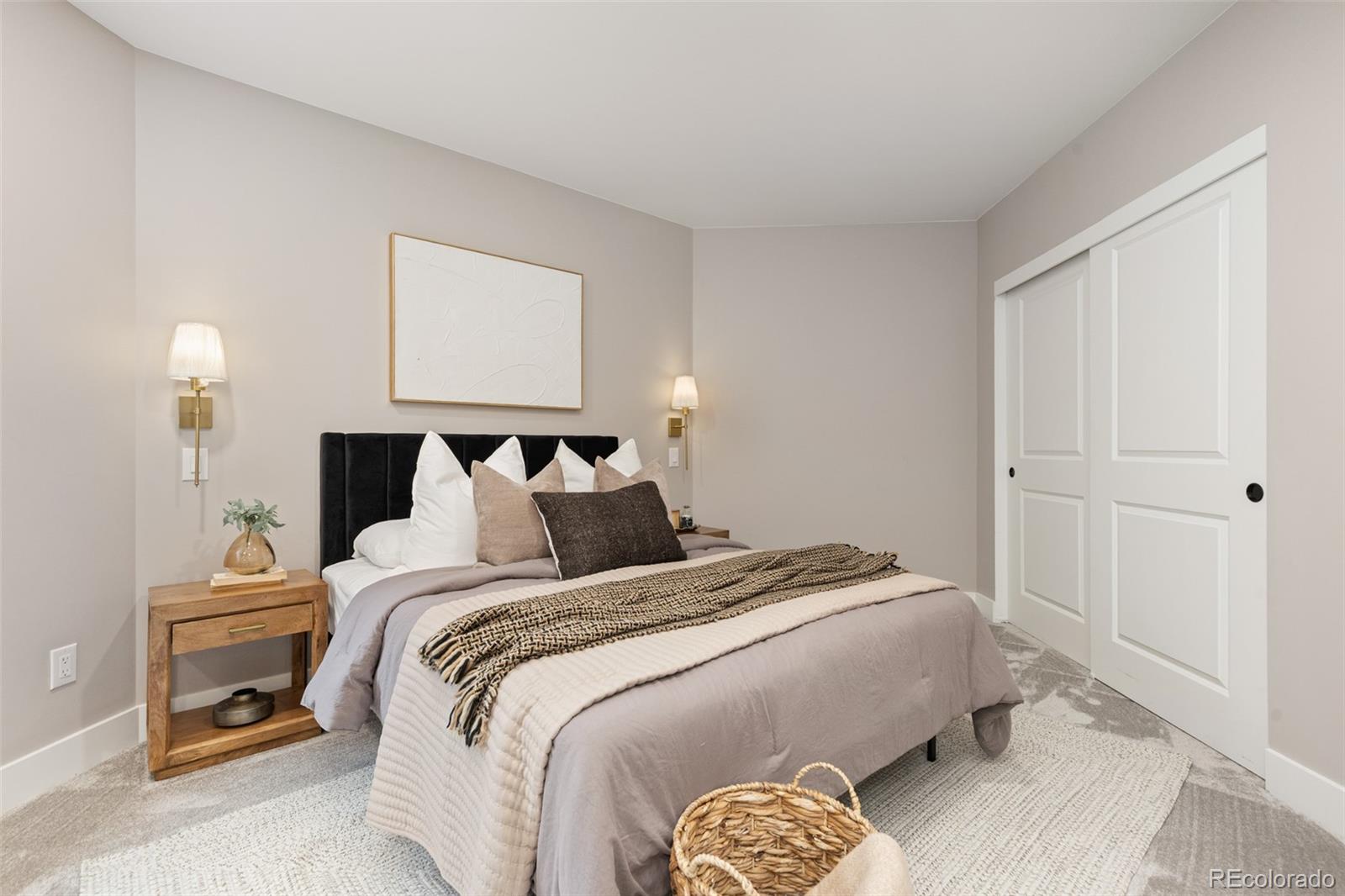 11895 West 35th Avenue Wheat Ridge, CO 80033 - Photo 38 of 50 a bedroom with bed and a night stand