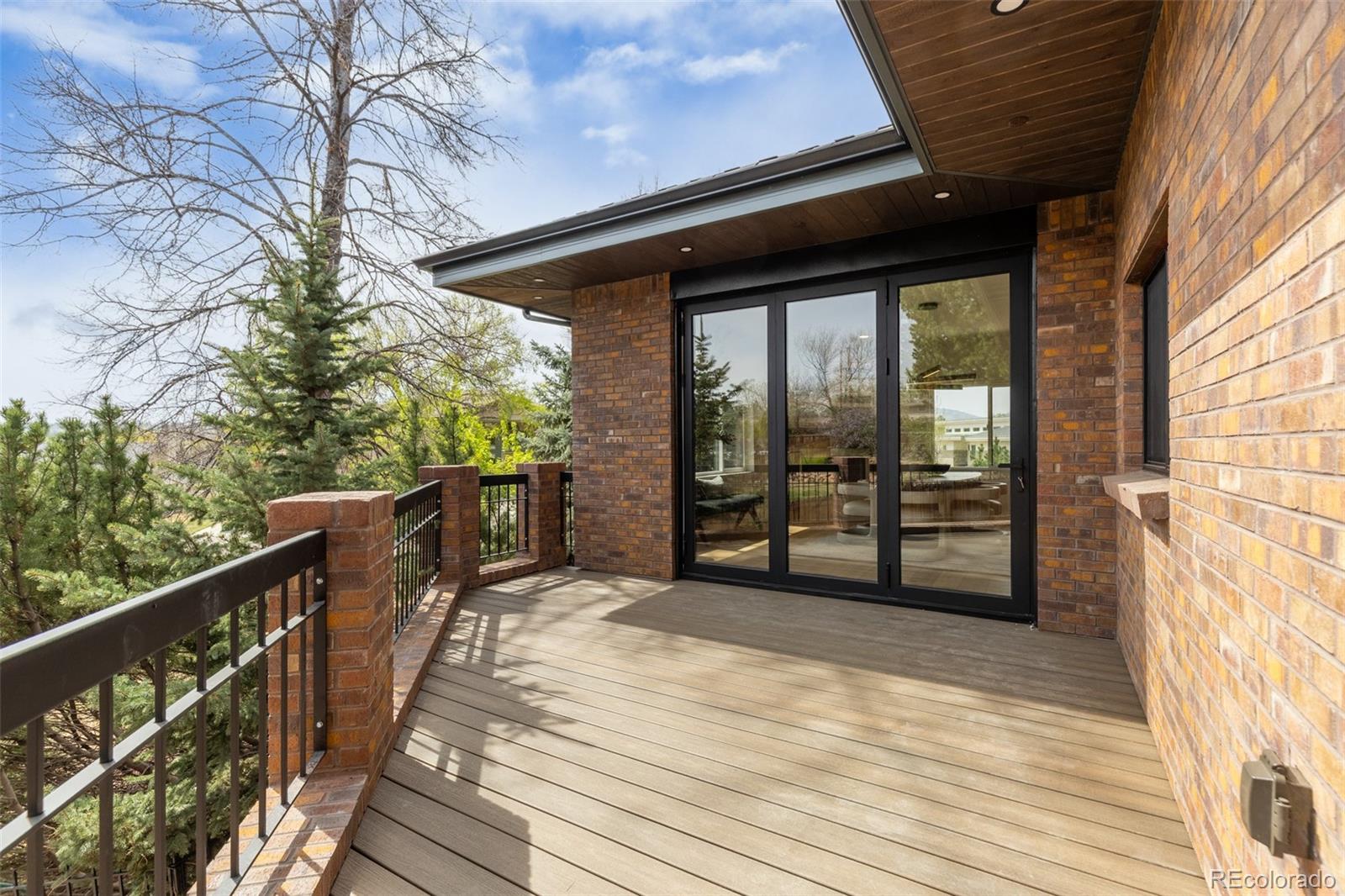 11895 West 35th Avenue Wheat Ridge, CO 80033 - Photo 44 of 50 a view of a balcony with wooden floor