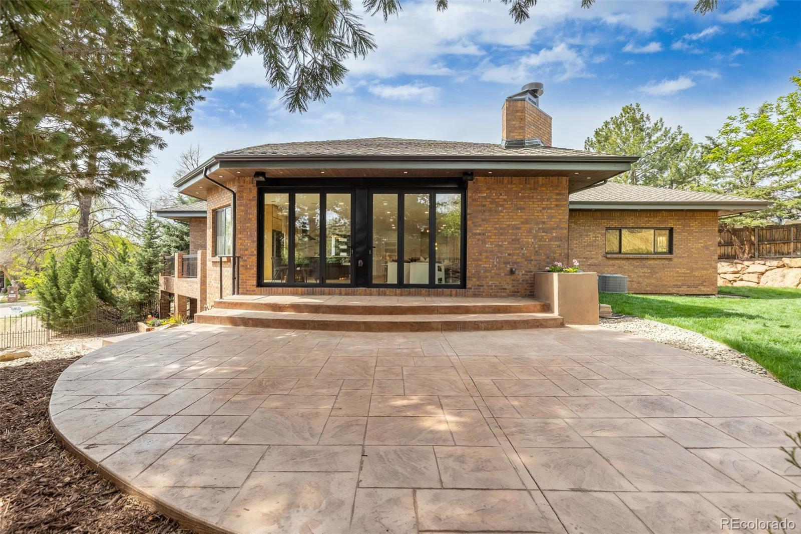 11895 West 35th Avenue Wheat Ridge, CO 80033 - Photo 46 of 50 front view of a house with a porch