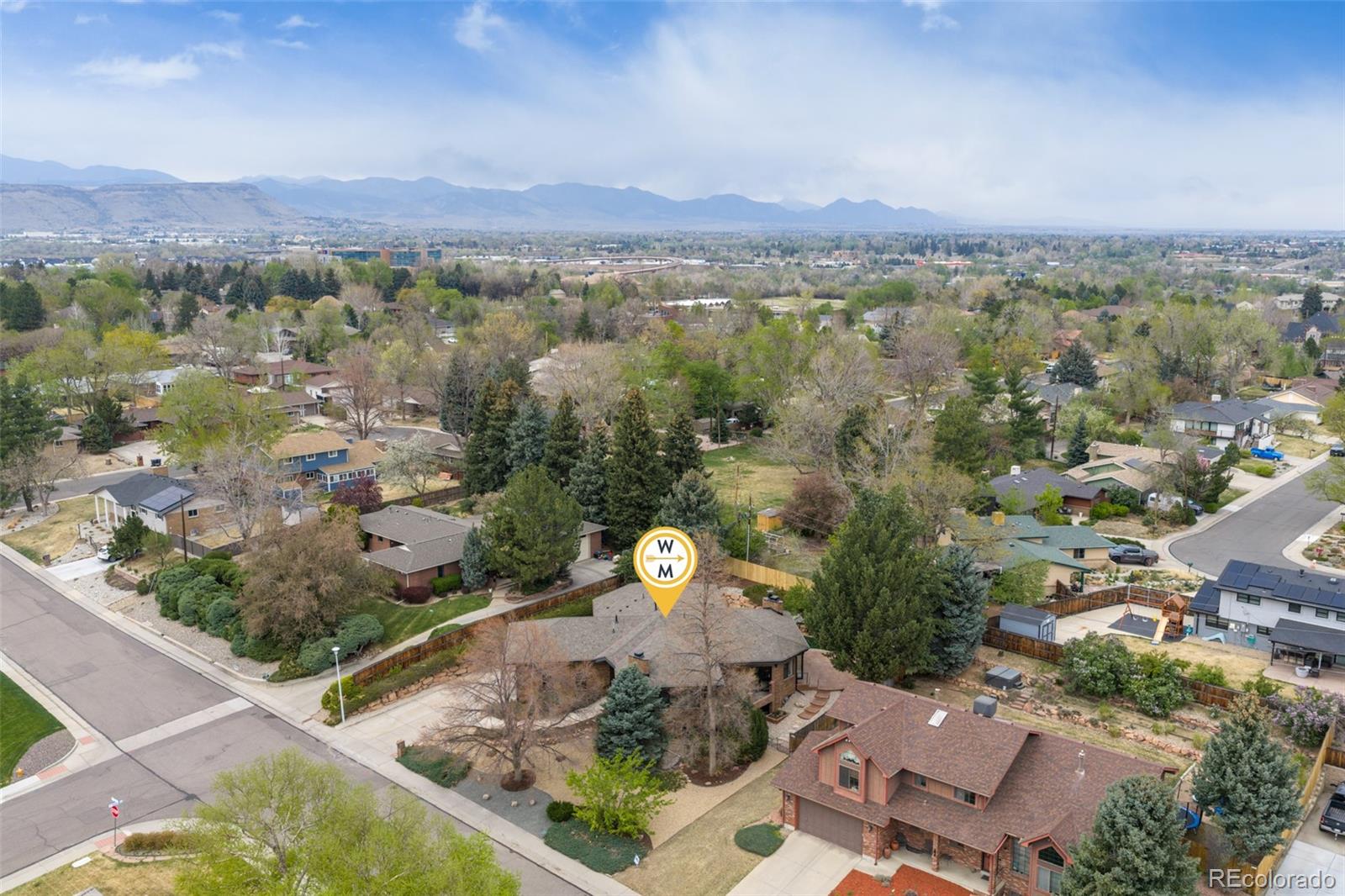 11895 West 35th Avenue Wheat Ridge, CO 80033 - Photo 48 of 50 an aerial view of a house with a garden