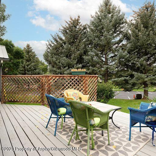 515 Park Circle Basalt, CO 81621 - Photo 13 of 25 a backyard of a house with table and chairs