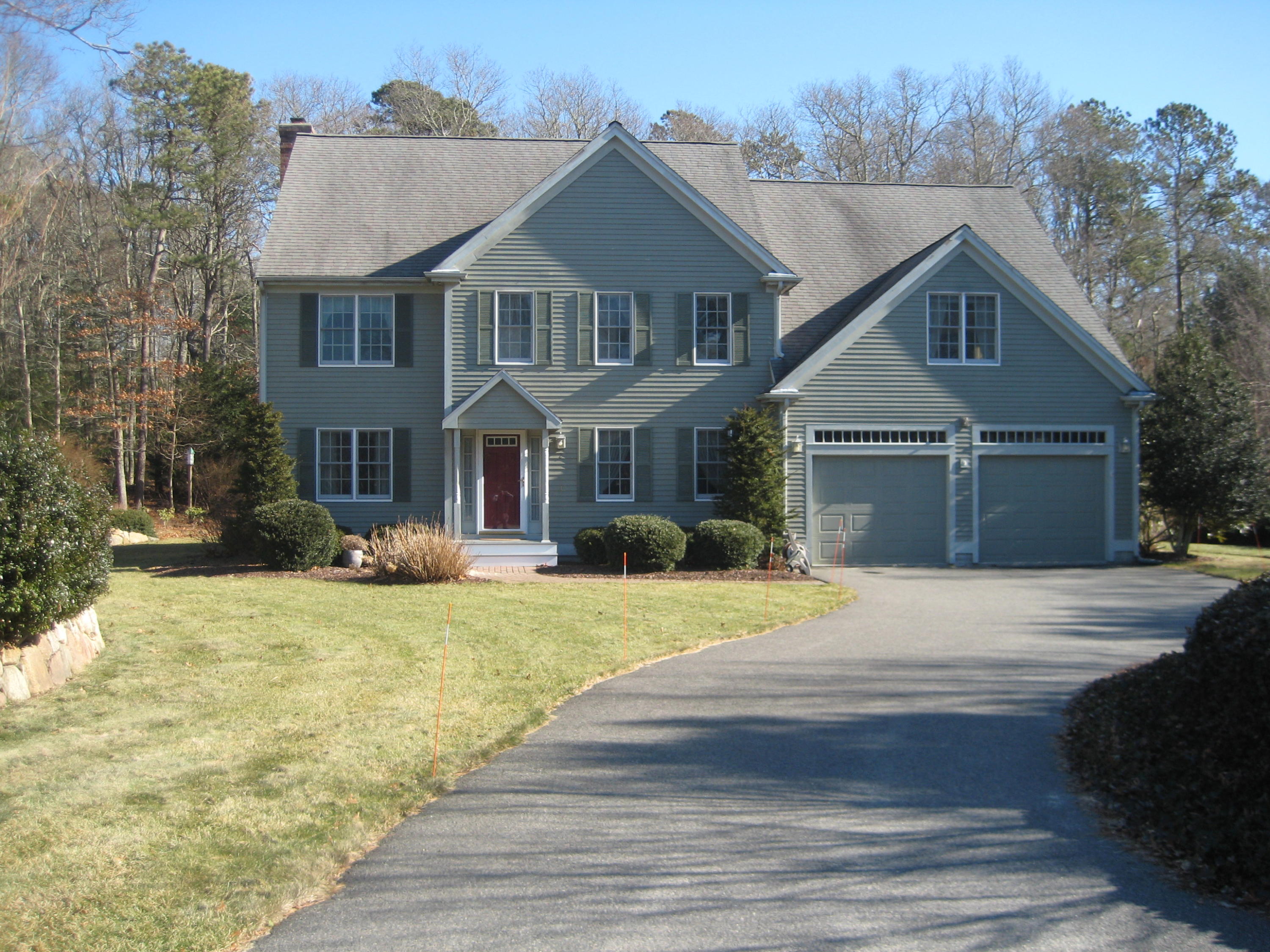 2 Tiffany Road Monument Beach, MA 02532 - Photo 1 of 35 a front view of a house with yard and green space