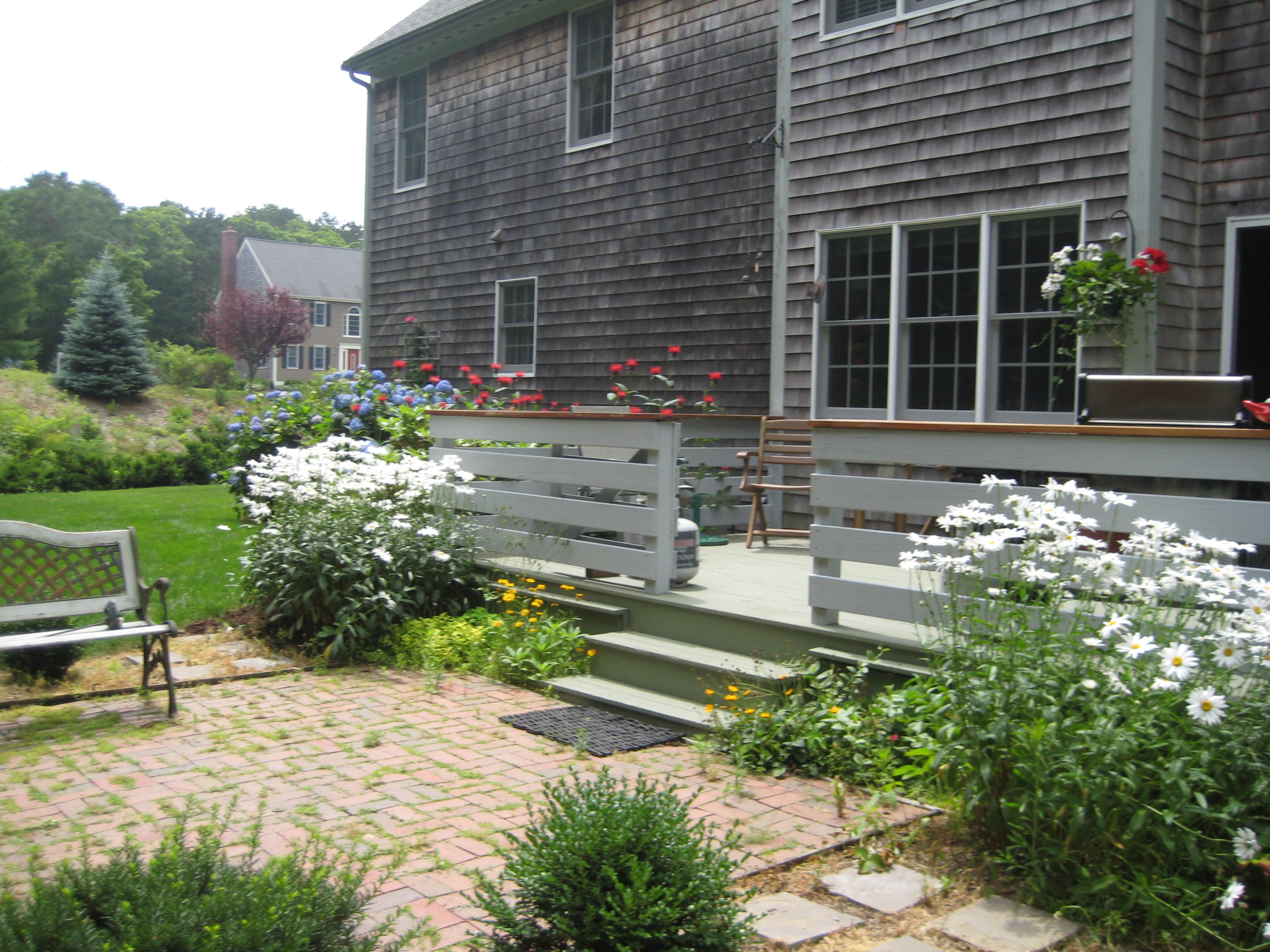 2 Tiffany Road Monument Beach, MA 02532 - Photo 32 of 35 a front view of a house with a yard