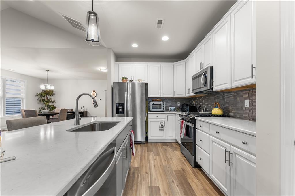 317 Anthem Way Canonsburg, PA 15317 - Photo 2 of 50 a kitchen with refrigerator cabinets and a sink