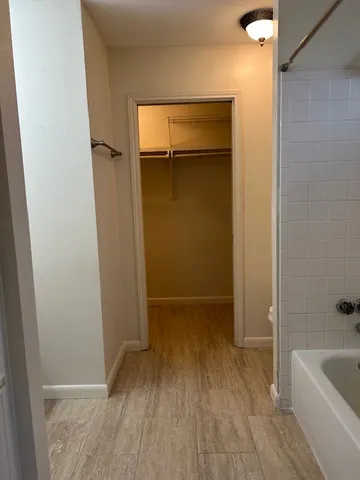 a bathroom with a sink a vanity and a mirror