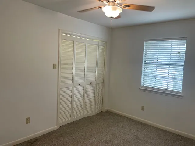 a view of outdoor space with deck and yard