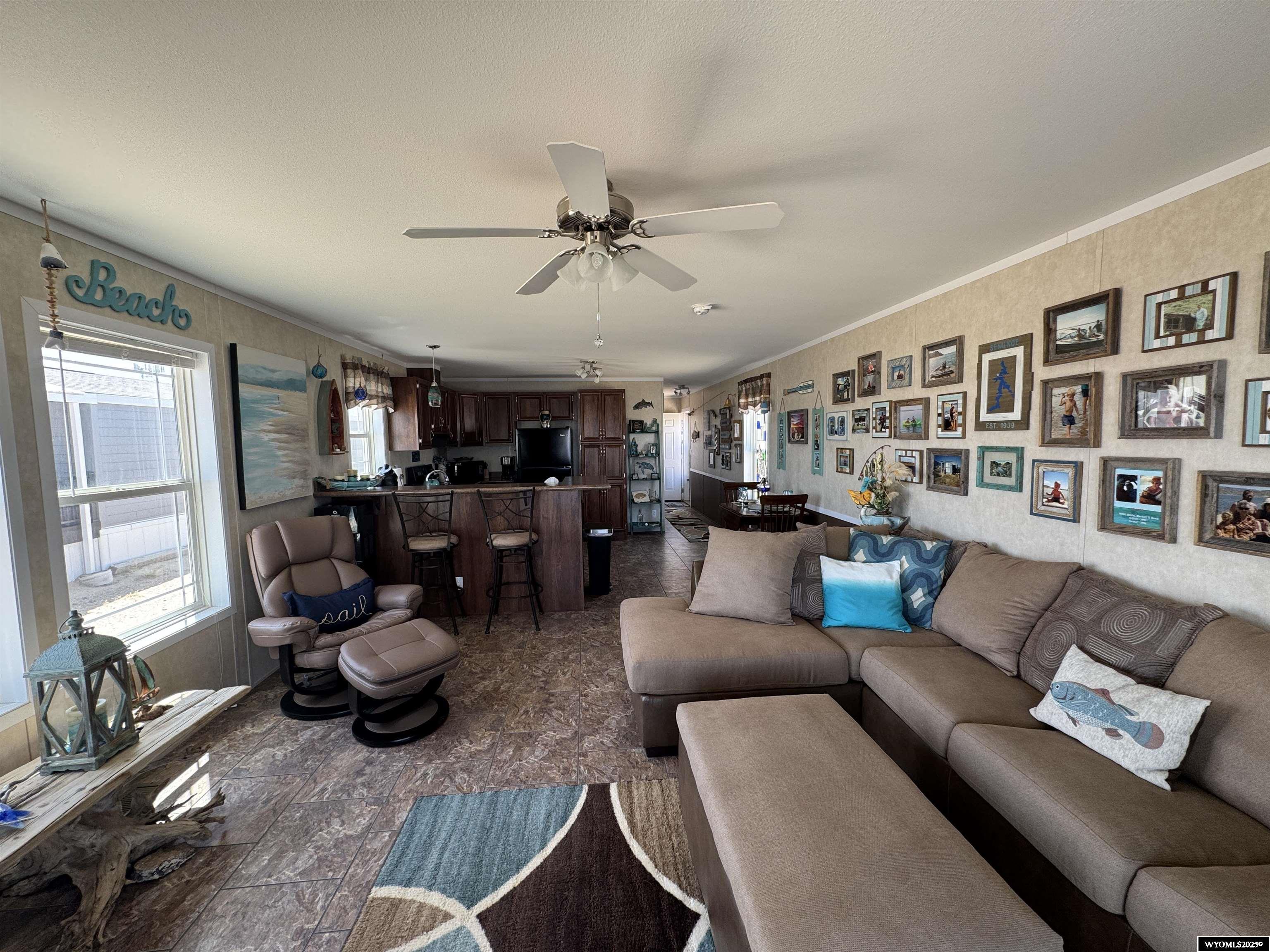 2469 C County Road 351 Sinclair, WY 82334 - Photo 11 of 32 Includes L shaped Hide-a-bed sofa with full ottoman and chair with ottoman.