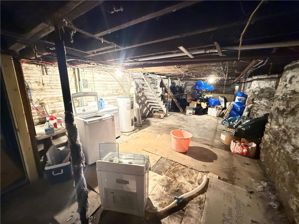 700 Philo Street Scranton, PA 18508 - Photo 19 of 19 Discover potential in this spacious, unfinished basement, offering ample room for future customization.