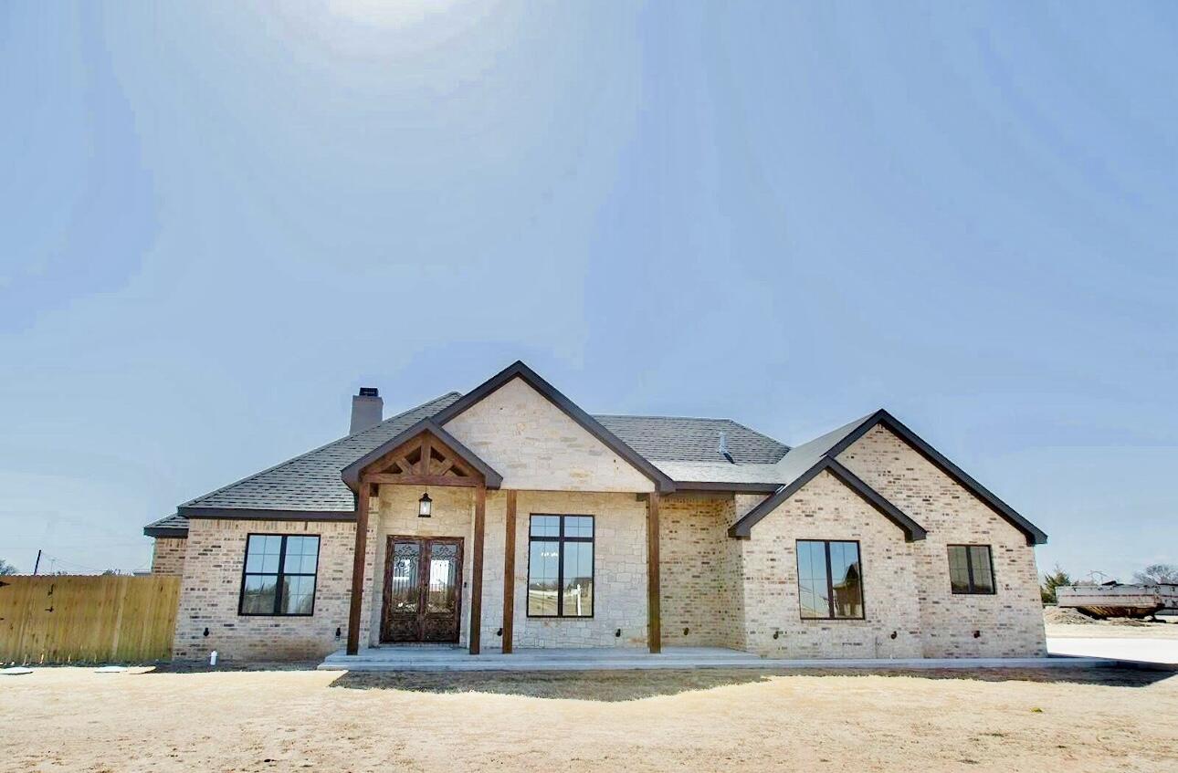 7211 West 12th Street Plainview, TX 79072 - Photo 1 of 48 a view of house with yard