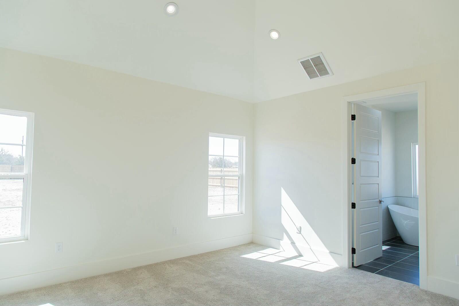 7211 West 12th Street Plainview, TX 79072 - Photo 24 of 48 a view of a bathroom with a toilet and a window