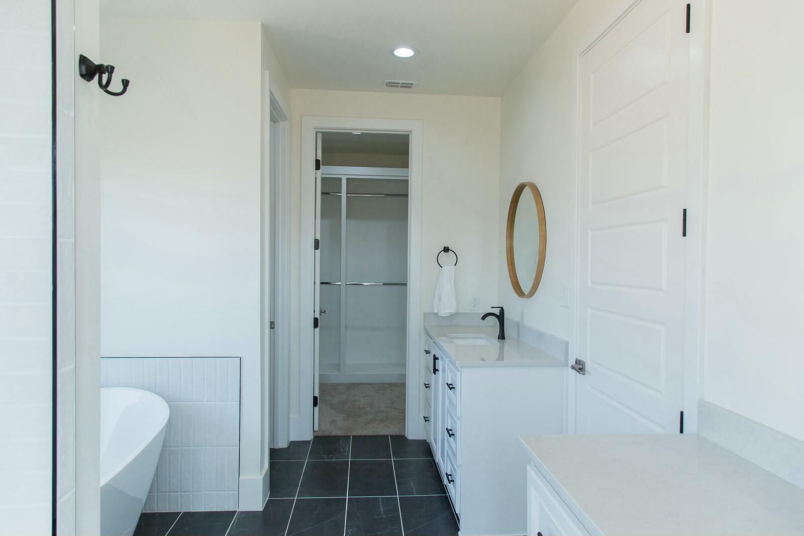 7211 West 12th Street Plainview, TX 79072 - Photo 30 of 48 a bathroom with a sink a toilet and shower