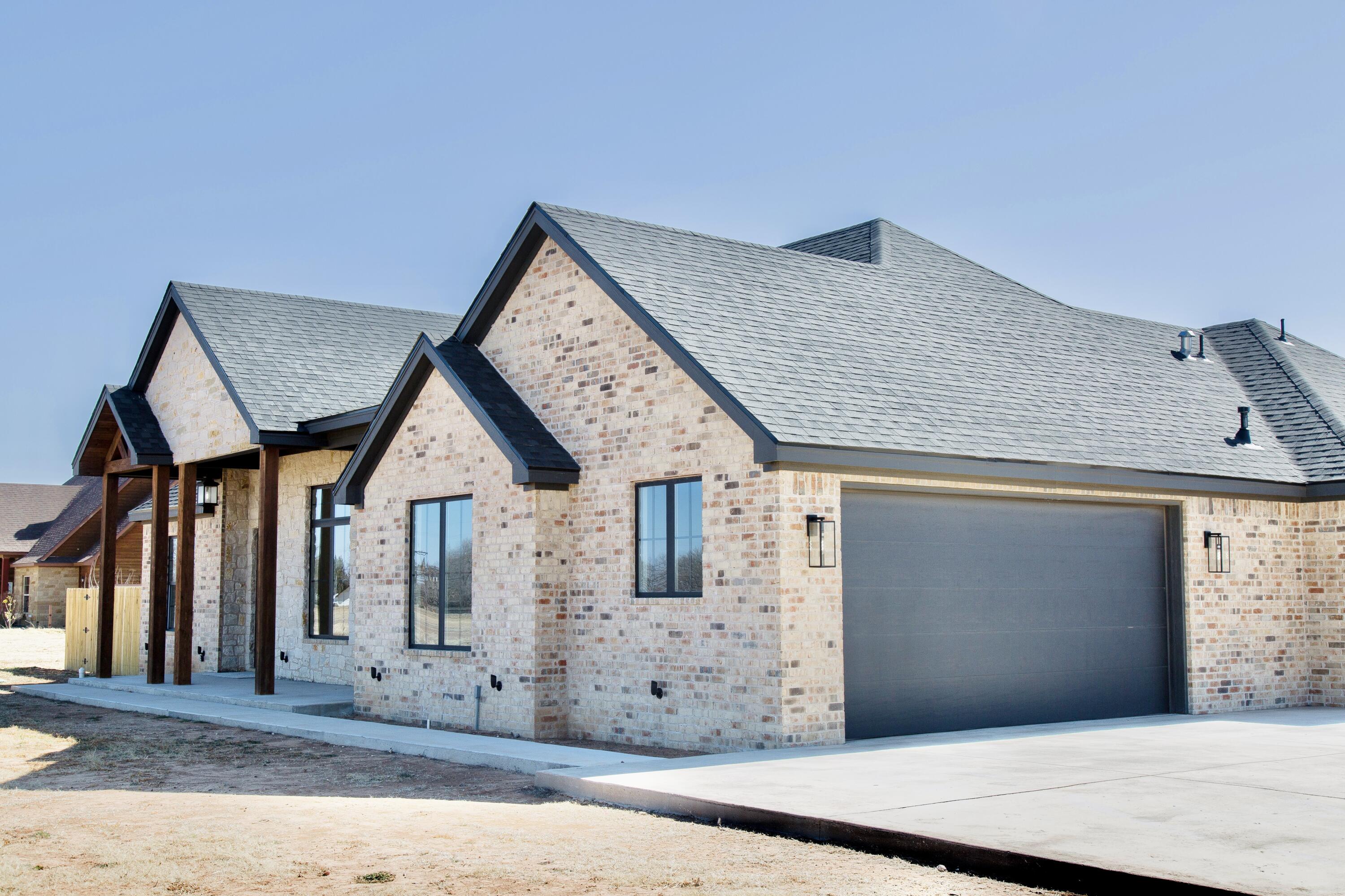 7211 West 12th Street Plainview, TX 79072 - Photo 3 of 48 a front view of a house