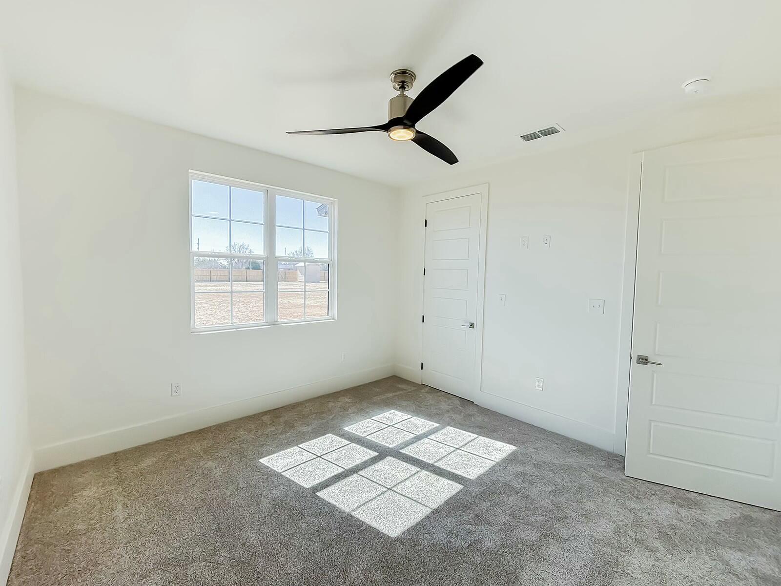 7211 West 12th Street Plainview, TX 79072 - Photo 39 of 48 a view of empty room with windows