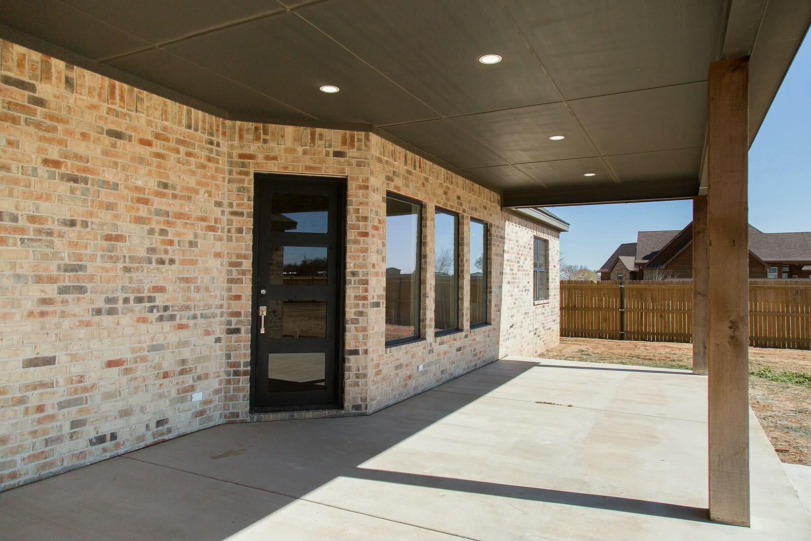 7211 West 12th Street Plainview, TX 79072 - Photo 40 of 48 a view of a hallway with wooden floor