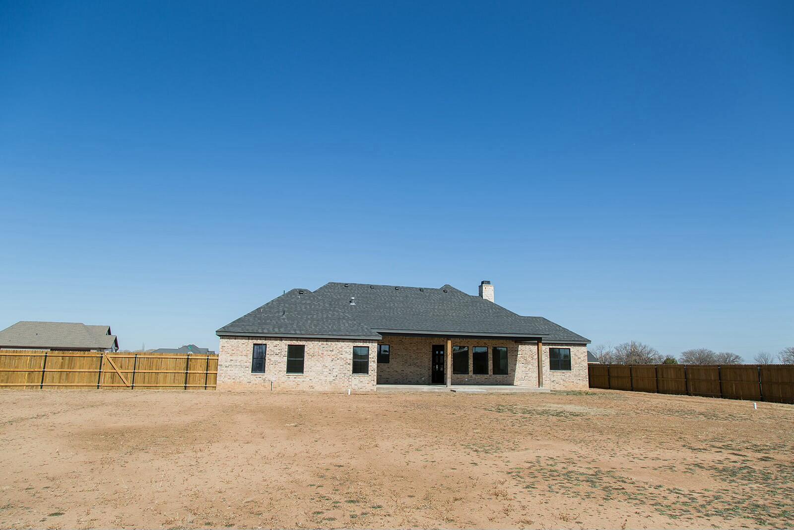 7211 West 12th Street Plainview, TX 79072 - Photo 44 of 48 a front view of a house with a yard