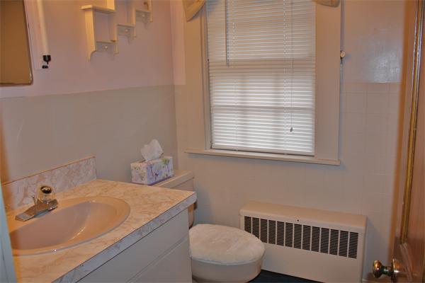 445 Falmouth Road Barnstable, MA 02601 - Photo 19 of 29 a bathroom with a sink and a toilet