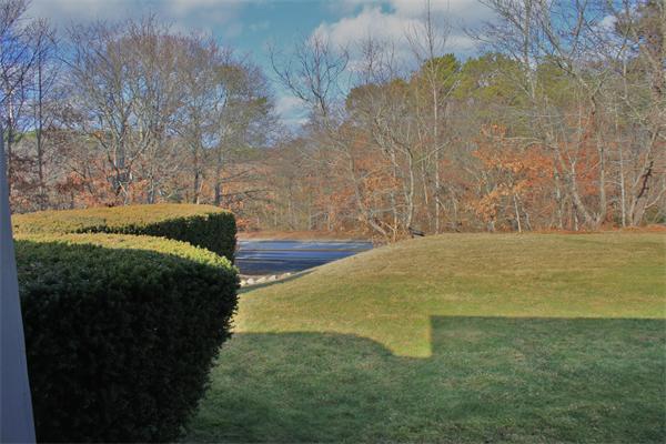 445 Falmouth Road Barnstable, MA 02601 - Photo 6 of 29 a view of a yard