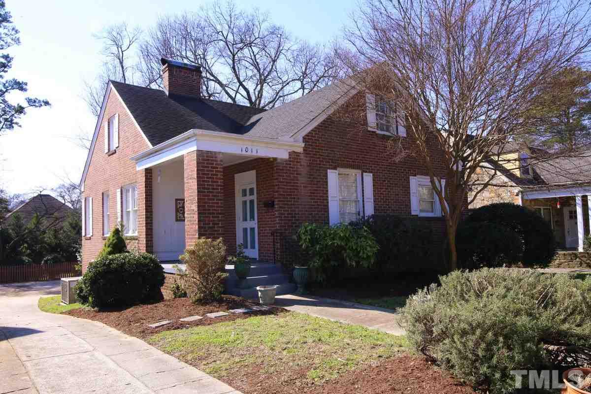 1011 Peace Street Raleigh, NC 27605 - Photo 1 of 25 a front view of house with yard outdoor seating and entertaining space