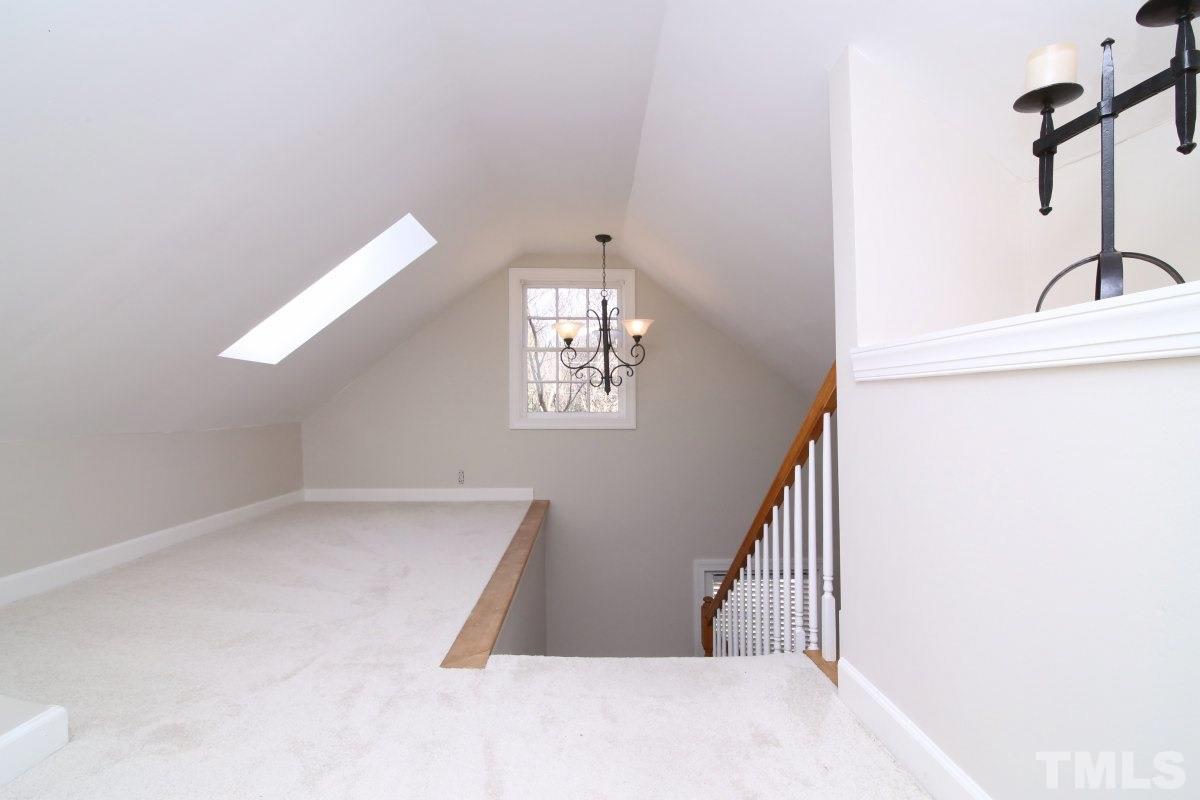 1011 Peace Street Raleigh, NC 27605 - Photo 18 of 25 a view of a hallway with staircase