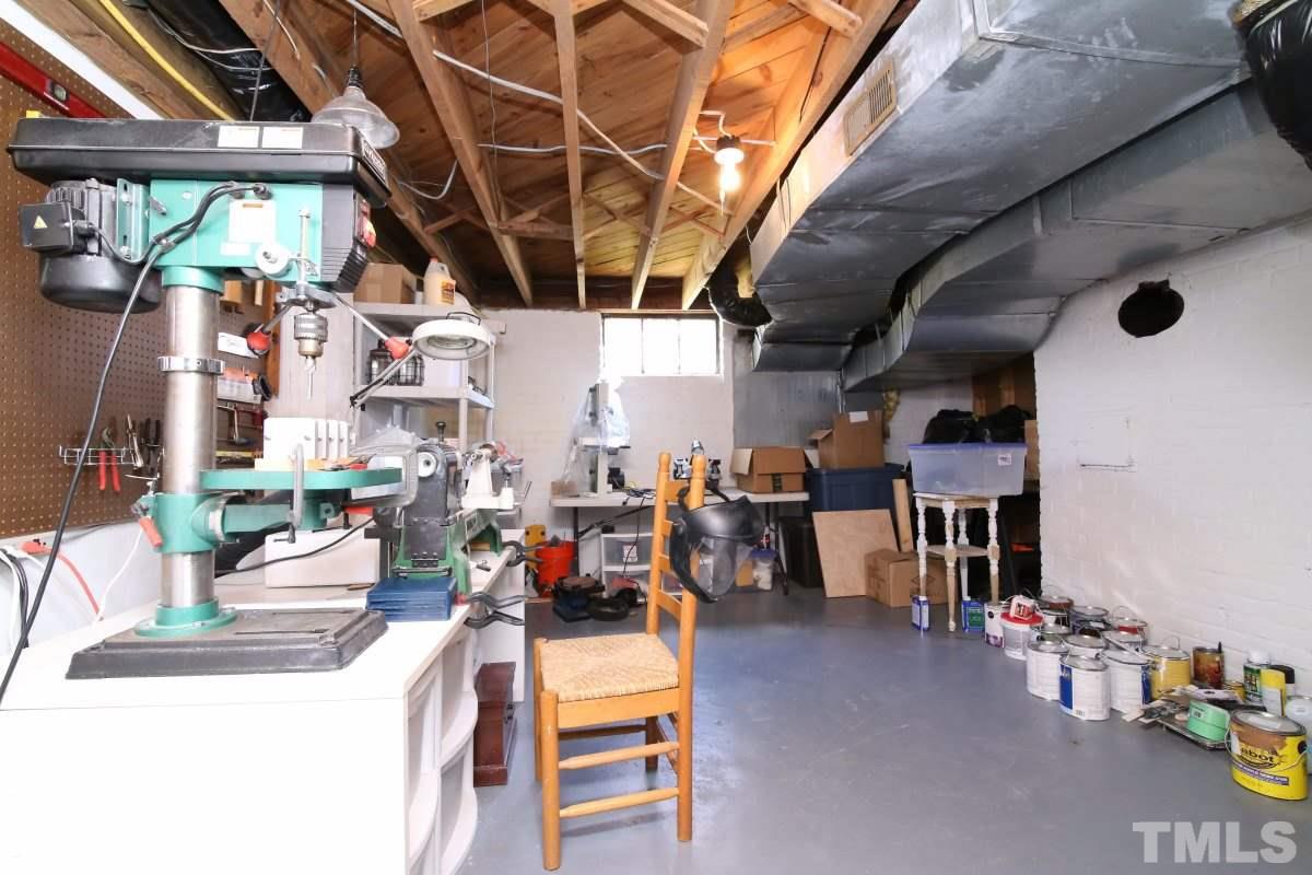 1011 Peace Street Raleigh, NC 27605 - Photo 22 of 25 a view of a storage room with a lot of stuff